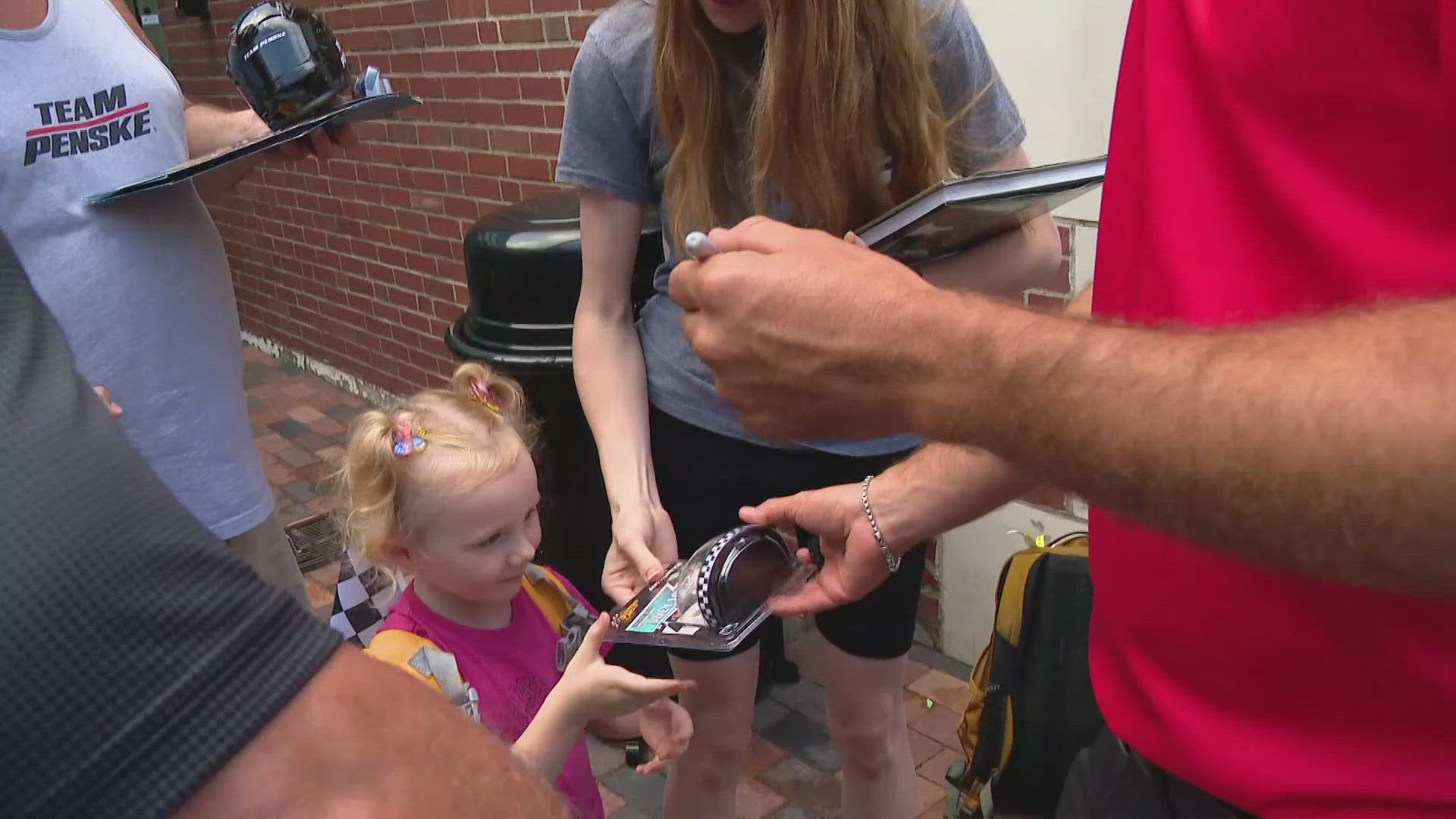 NASCAR driver and champion Joey Logano joined the event and signed autographs for fans ahead of the Brickyard 400.