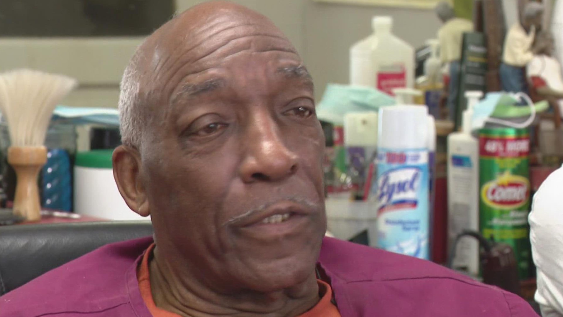 Thomas Carey has been cutting hair for more than 60 years. His Superior Barber shop was targeted for robbery last week.