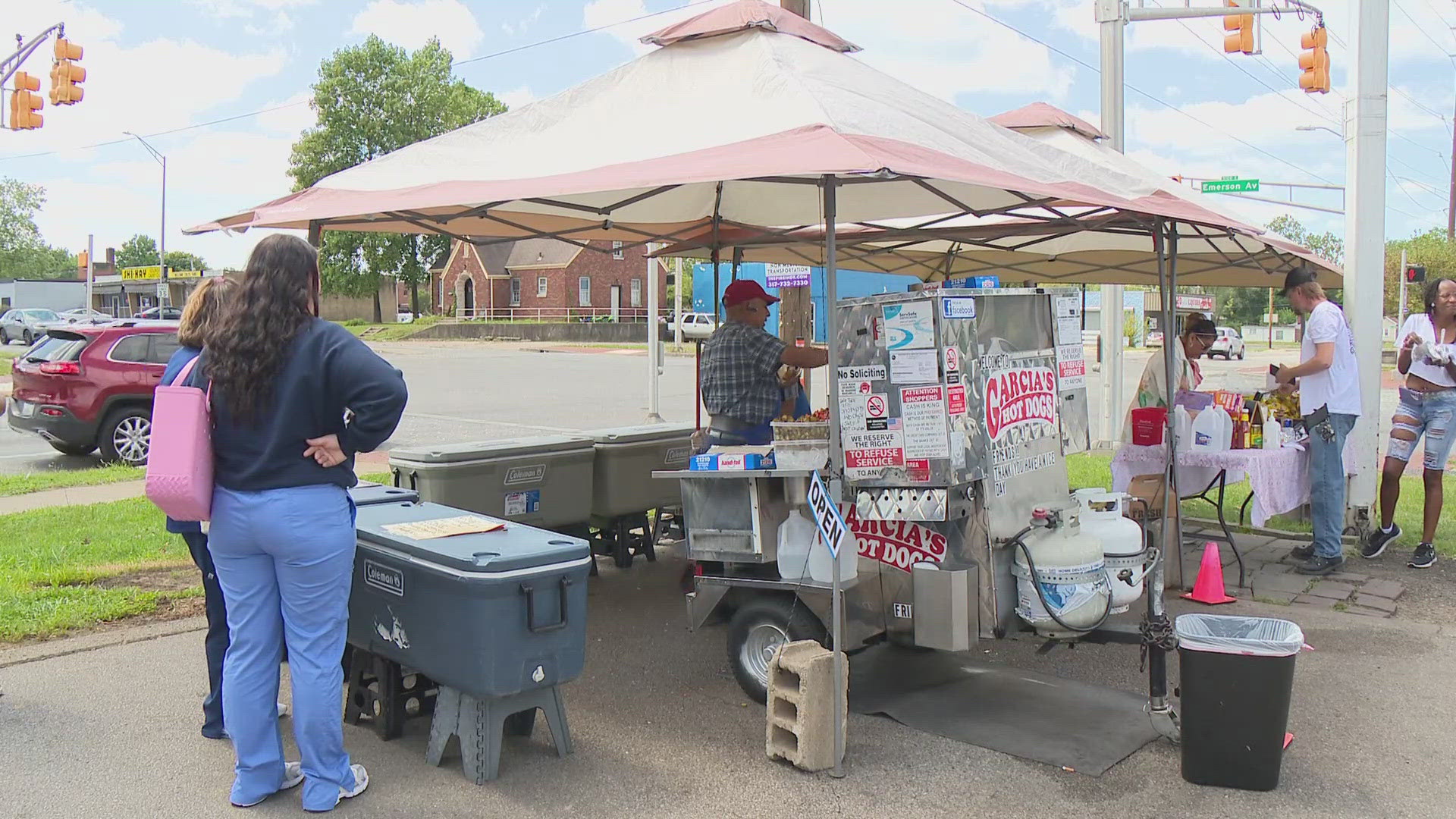 The owner of Garcia's Hot Dogs says he needs to transition from a cart to a food truck to be able to comply with local rules.