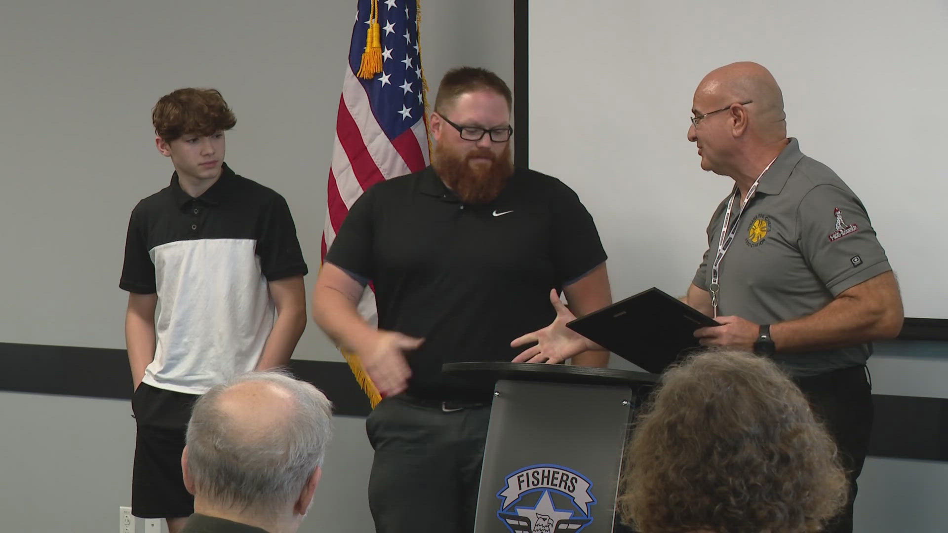 Adam Barr was honored by both Fishers police and fire for helping to save a teen's life.