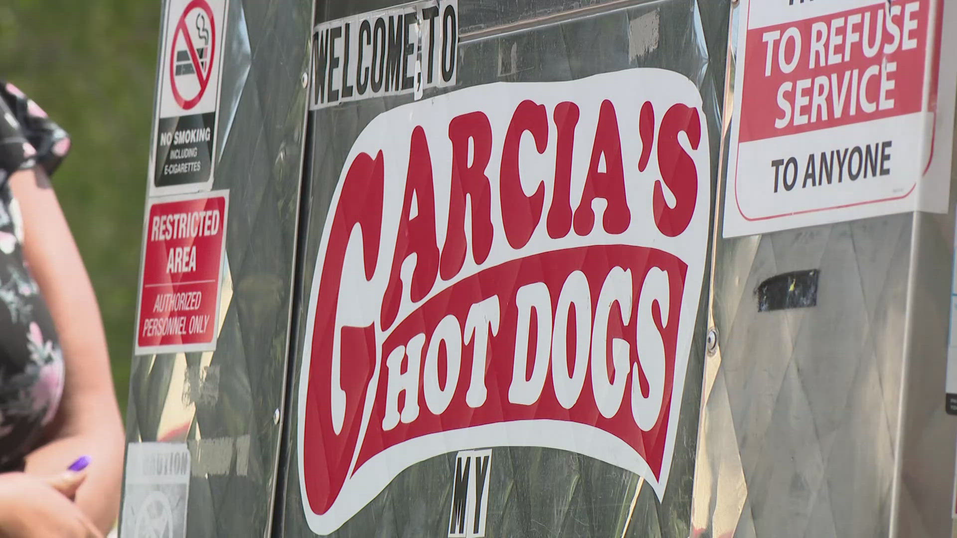 The owner of Garcia's Hot Dogs has officially signed a contract to get his food truck mobile kitchen up and running.