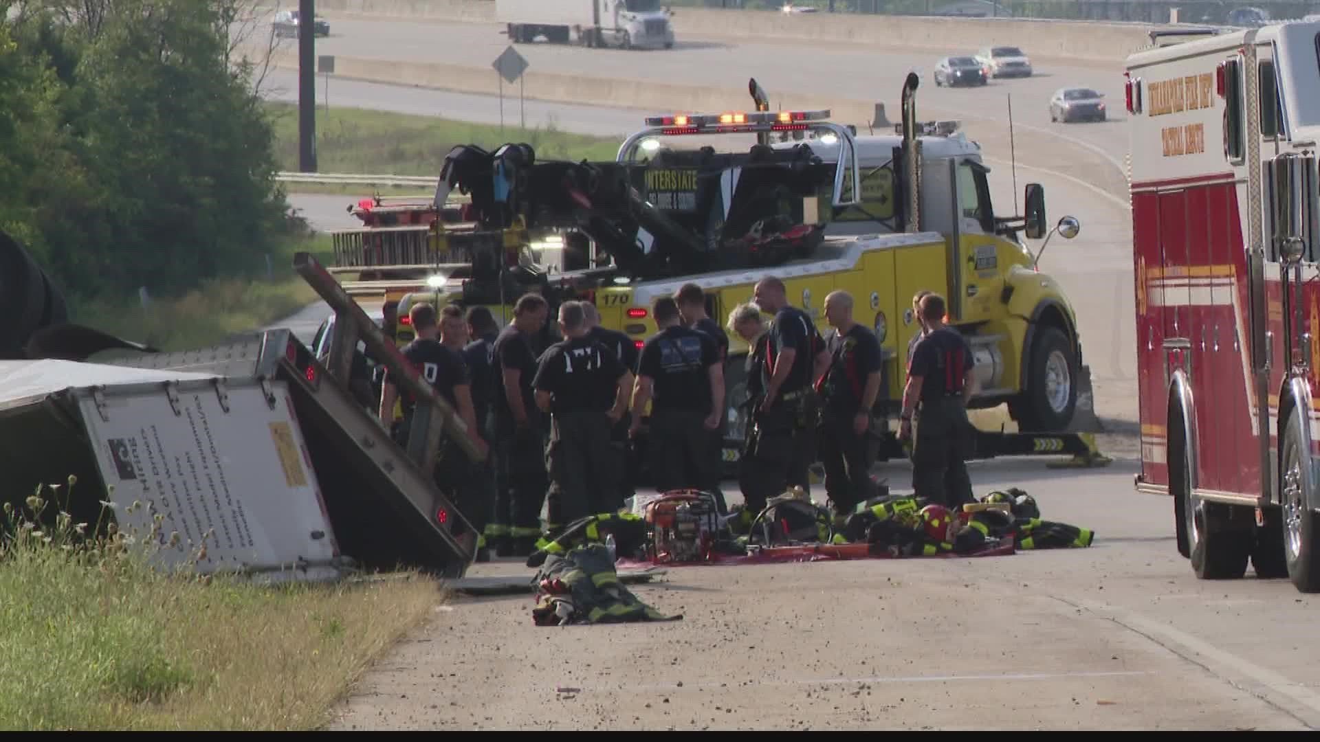 The semi went down an embankment north of the on-ramp to westbound I-70.