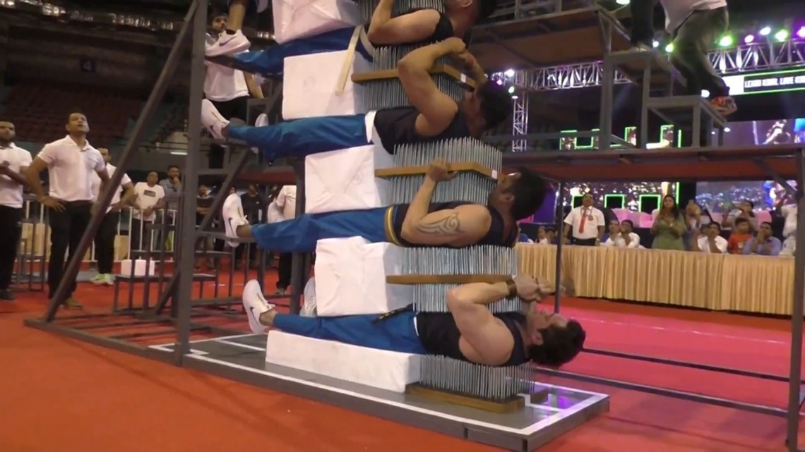 WATCH Recordsetting bed of nail sandwich