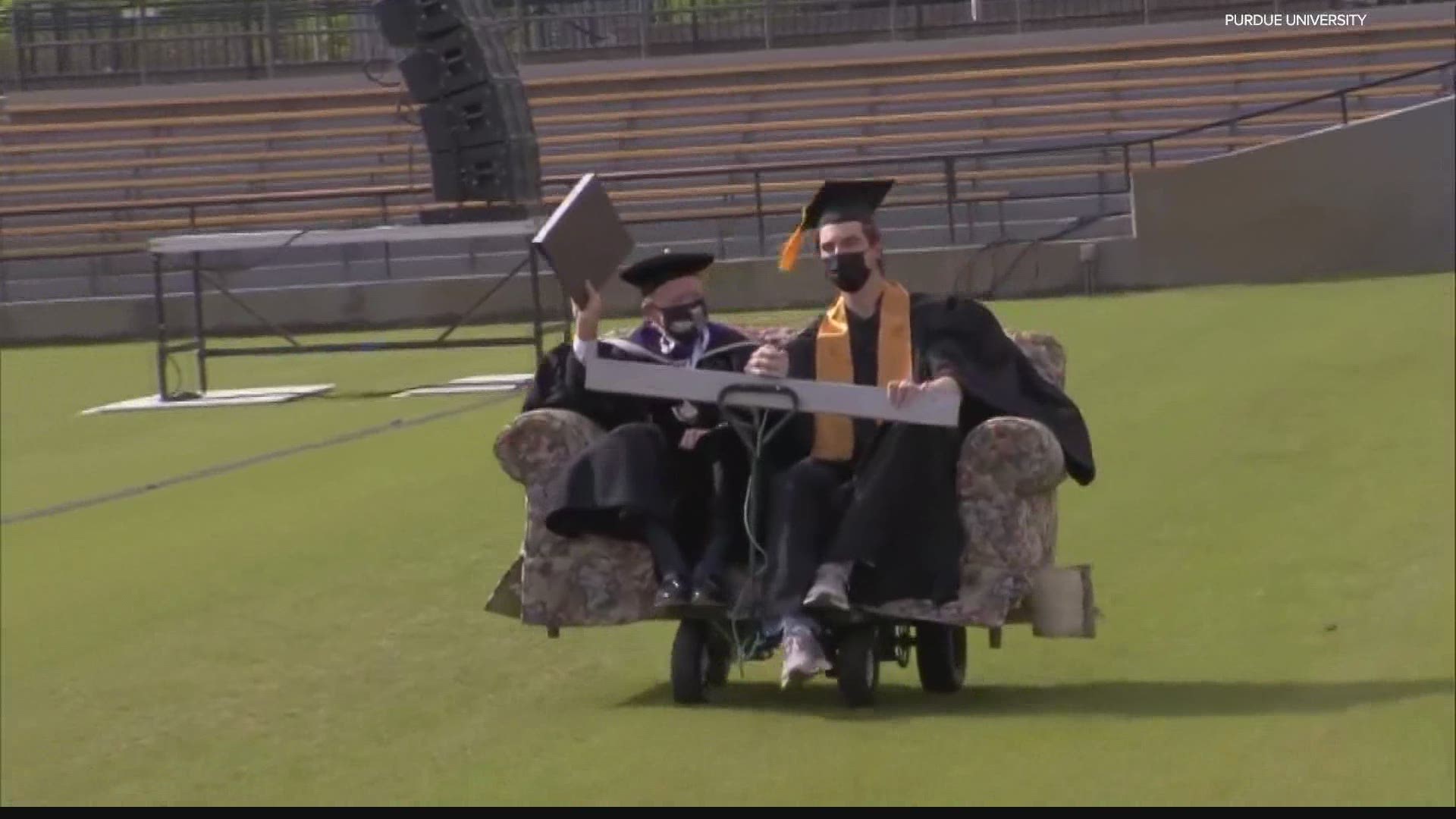 Former Indiana governor and current Purdue University President Mitch Daniels arrived at the university's commencement via a "couch cart."