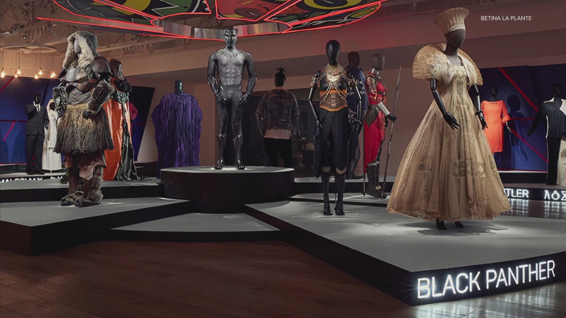 The exhibit features powerful pieces from movies like "Black Panther" and "Roots" and opens in March of next year.