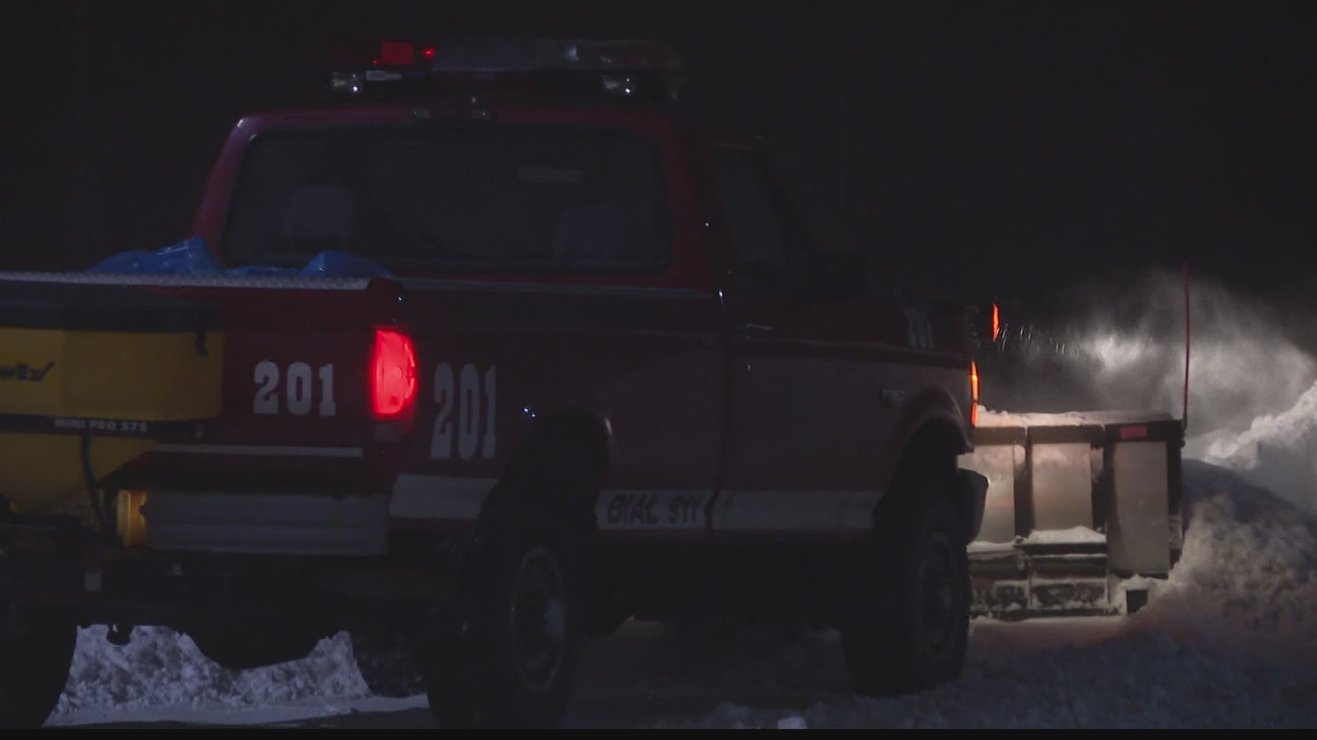 Emergency vehicles were being escorted by a plow-equipped truck in some areas Monday.