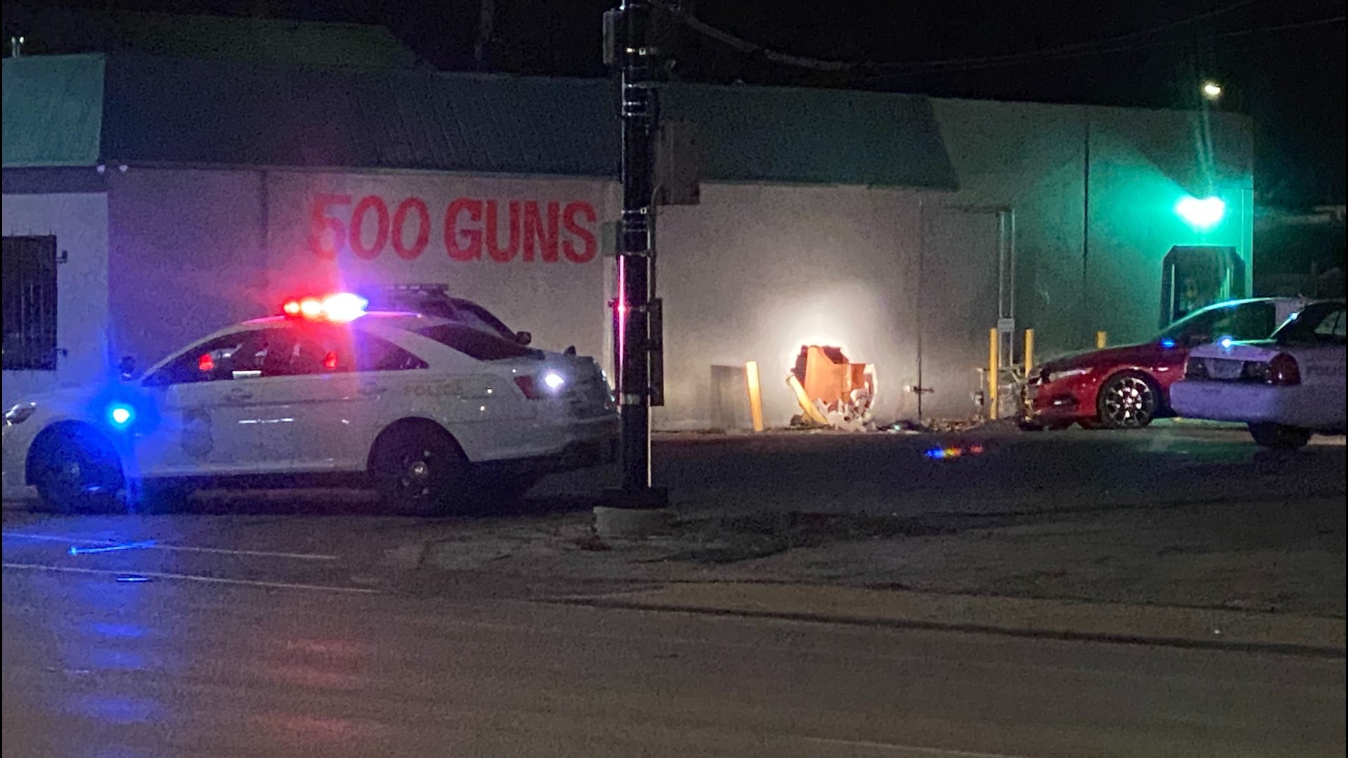 Police say a suspect stole several weapons after driving into the side of 500 guns on W. 16th Street.