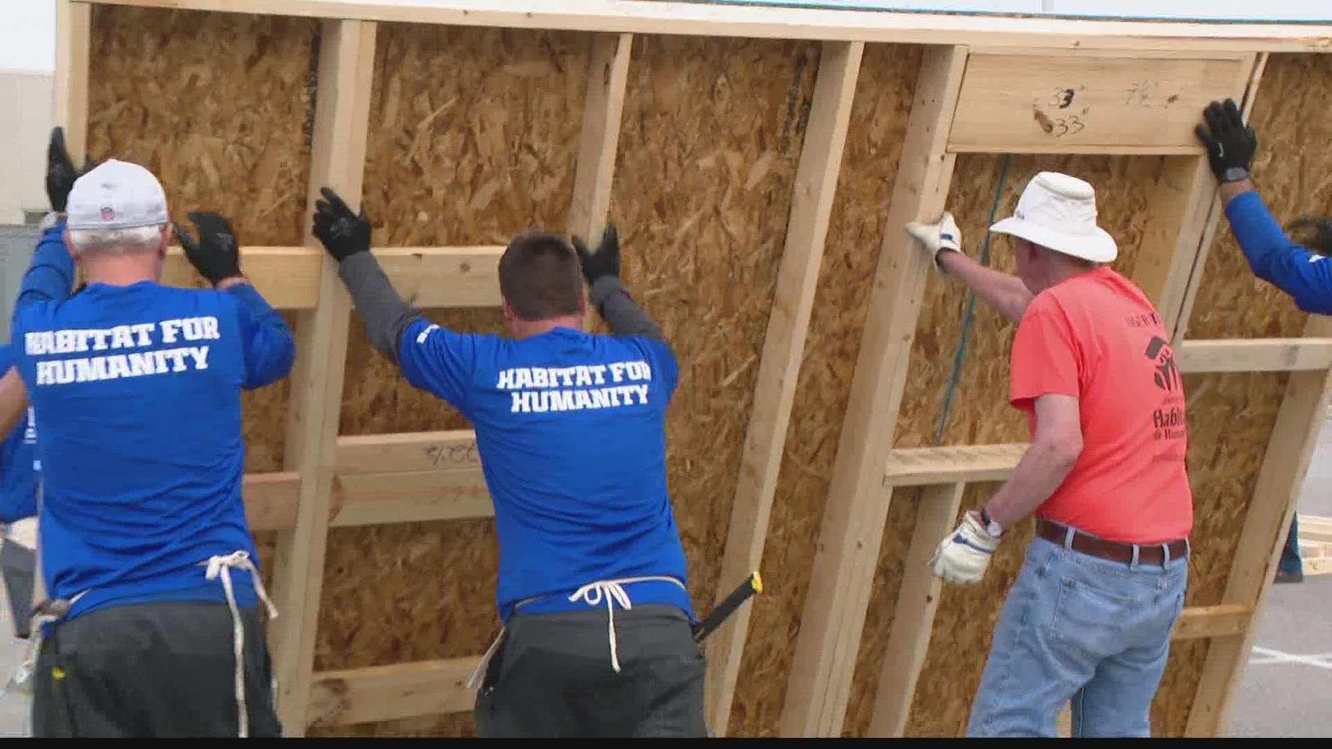 The Indianapolis Colts traded their helmets and cleats for hammers and nails to help a great cause.