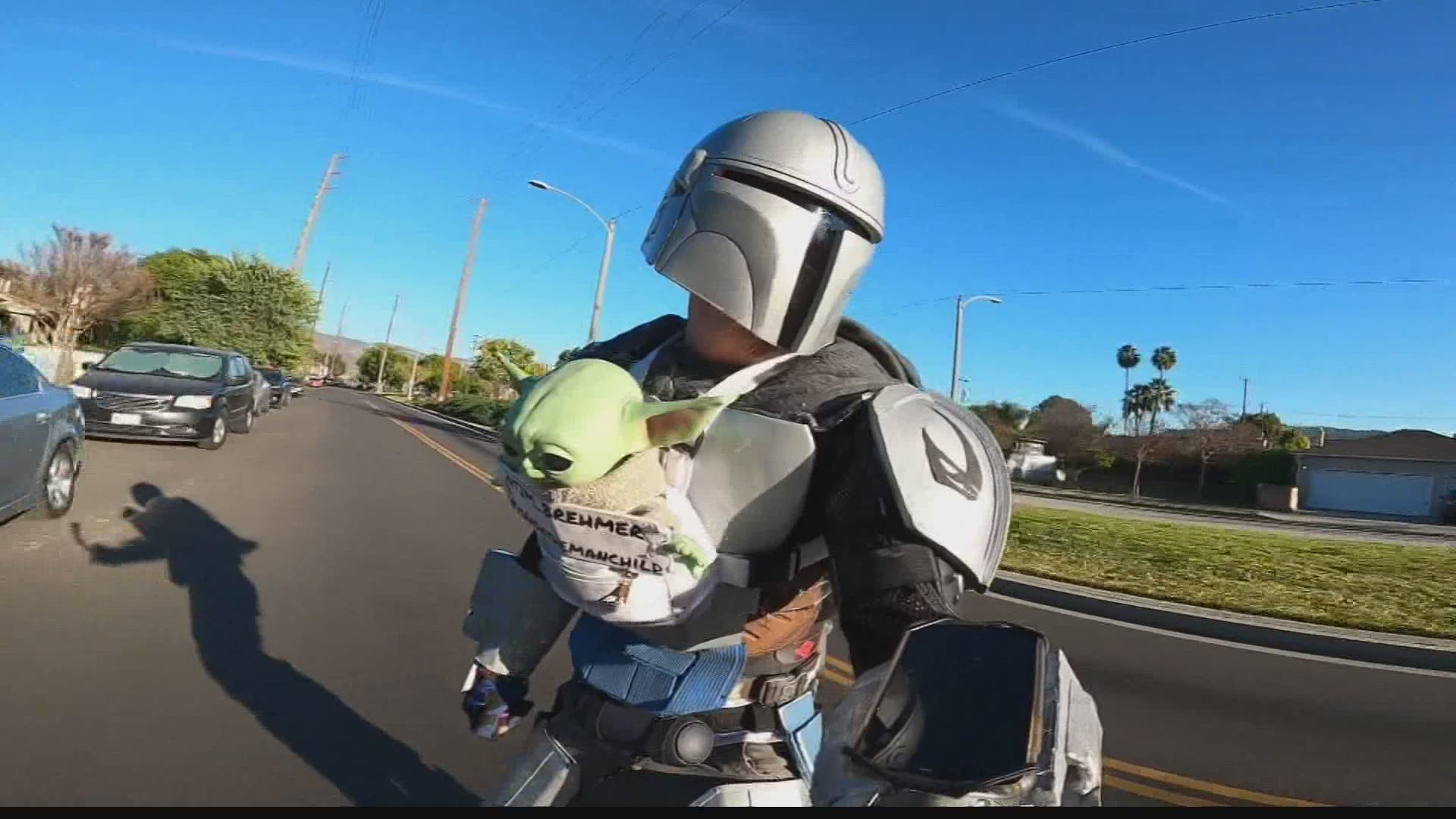 Los Angeles comedian Tim Brehmer decided to put a smile on people's faces by dressing up and riding a skateboard as  the Mandalorian — accompanied with Baby Yoda.