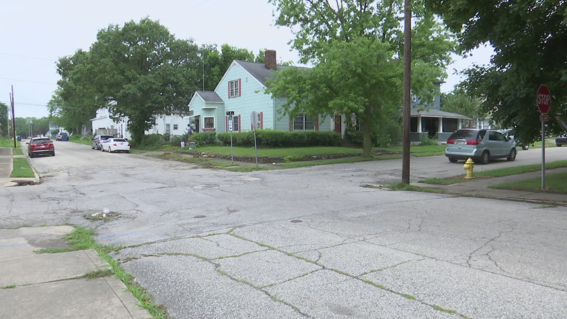 Police say officers saw a suspect shoot at a pedestrian from a white SUV. After an officer fired shots at the suspect, the suspect ran from police.