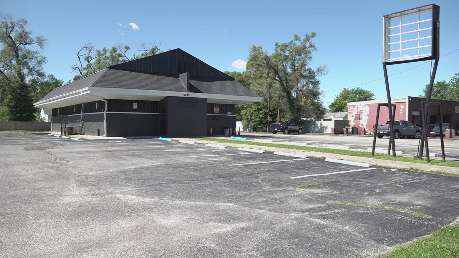 13News reporter Chase Houle talks with neighbors in the English Avenue area who say they are happy to see "Club Paradise" close.