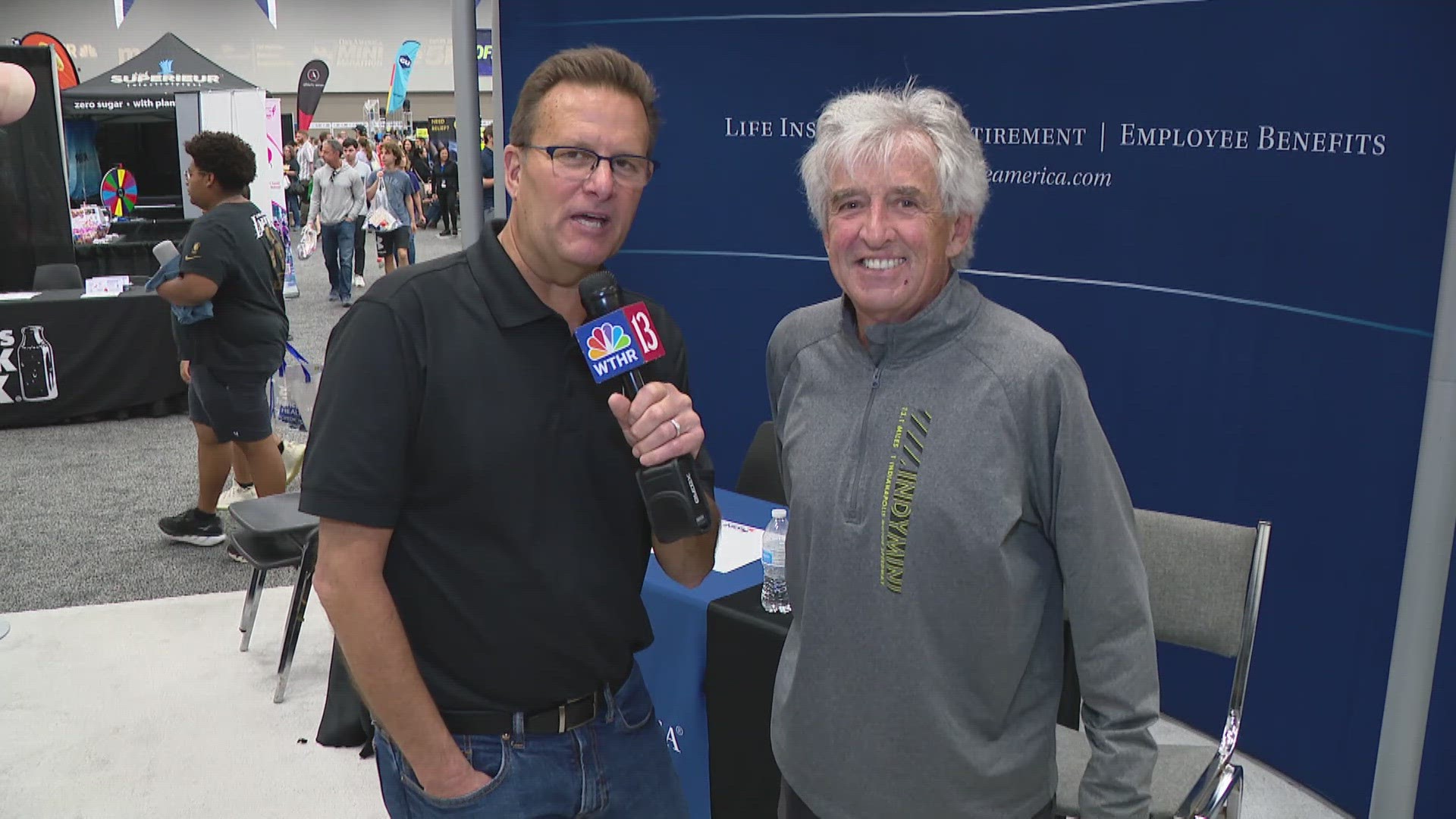 Dave Calabro talks with 1972 Olympic gold medalist Frank Shorter about Saturday's OneAmerica 500 Festival Mini-Marathon.