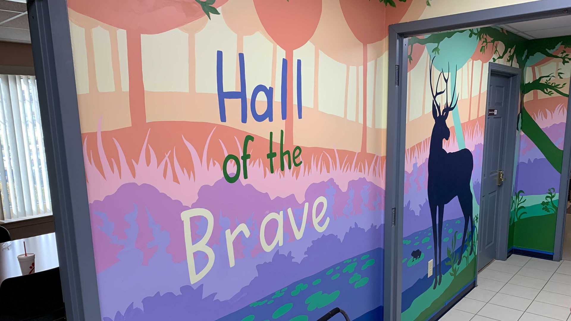 About a dozen people worked on the "Hall of the Brave." They started painting in early December and finished the mural just before Christmas.