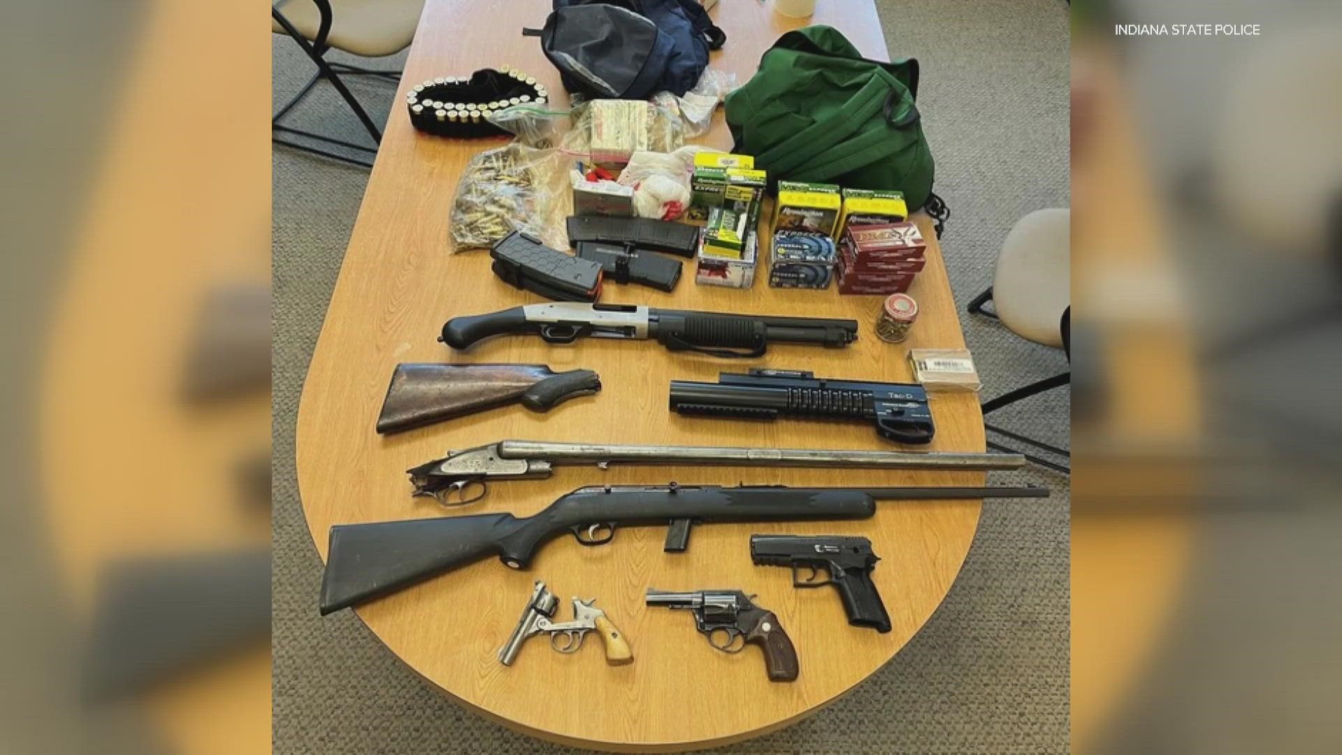 Police are releasing photos of a stockpile of weapons found after a chase ends on the interstate.