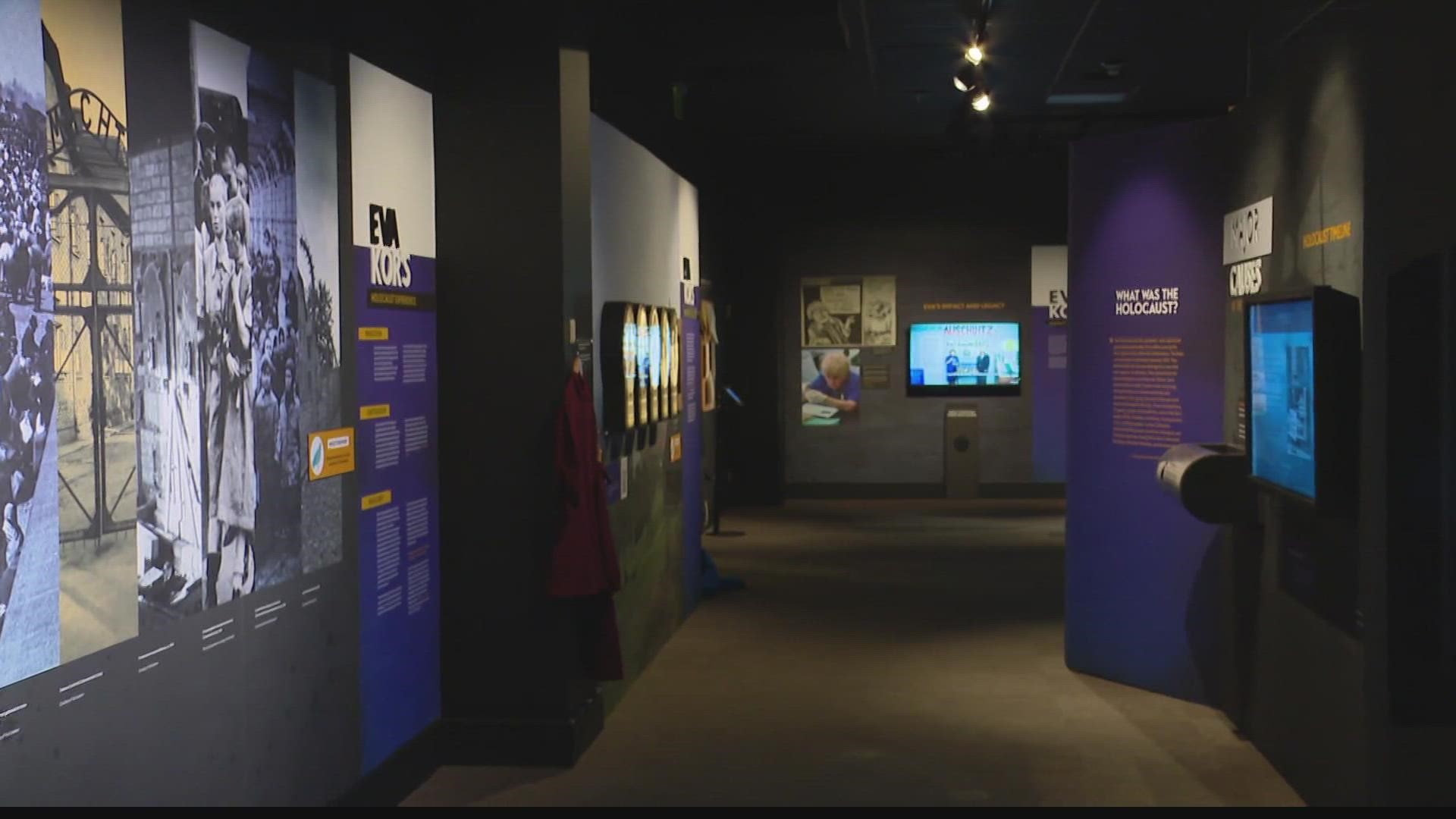 The exhibit features a virtual reality tour of Auschwitz with the Holocaust survivor.