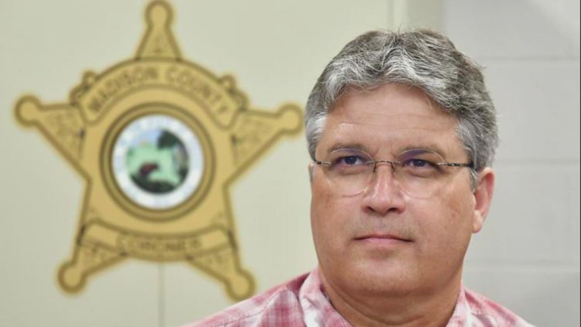 The former Madison County coroner is accused of leaving more than $130K of unpaid bills when he resigned.