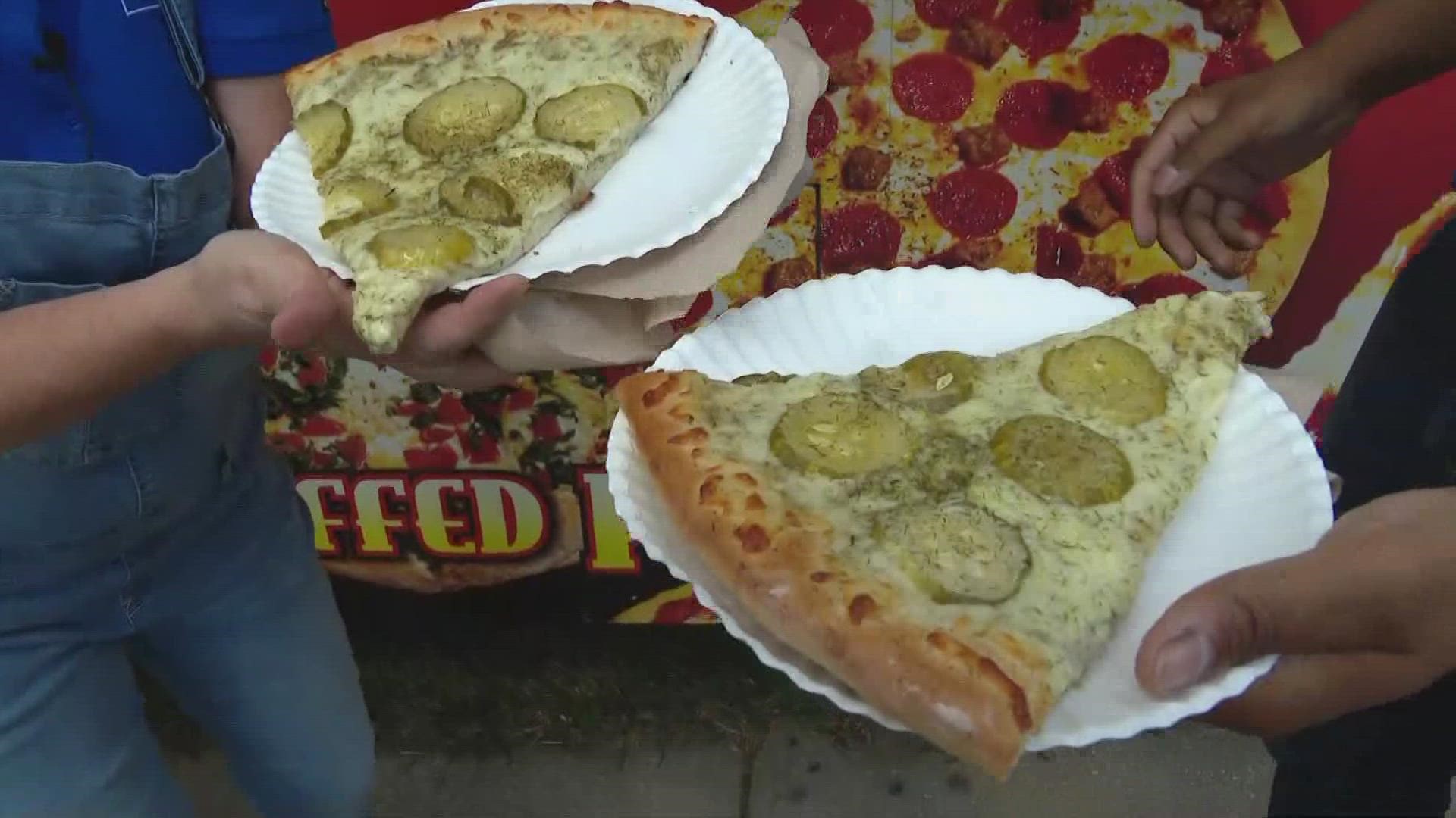 Don't let Carlos and Lindsey fool you - the pickle pizza is a delight at the Indiana State Fair.