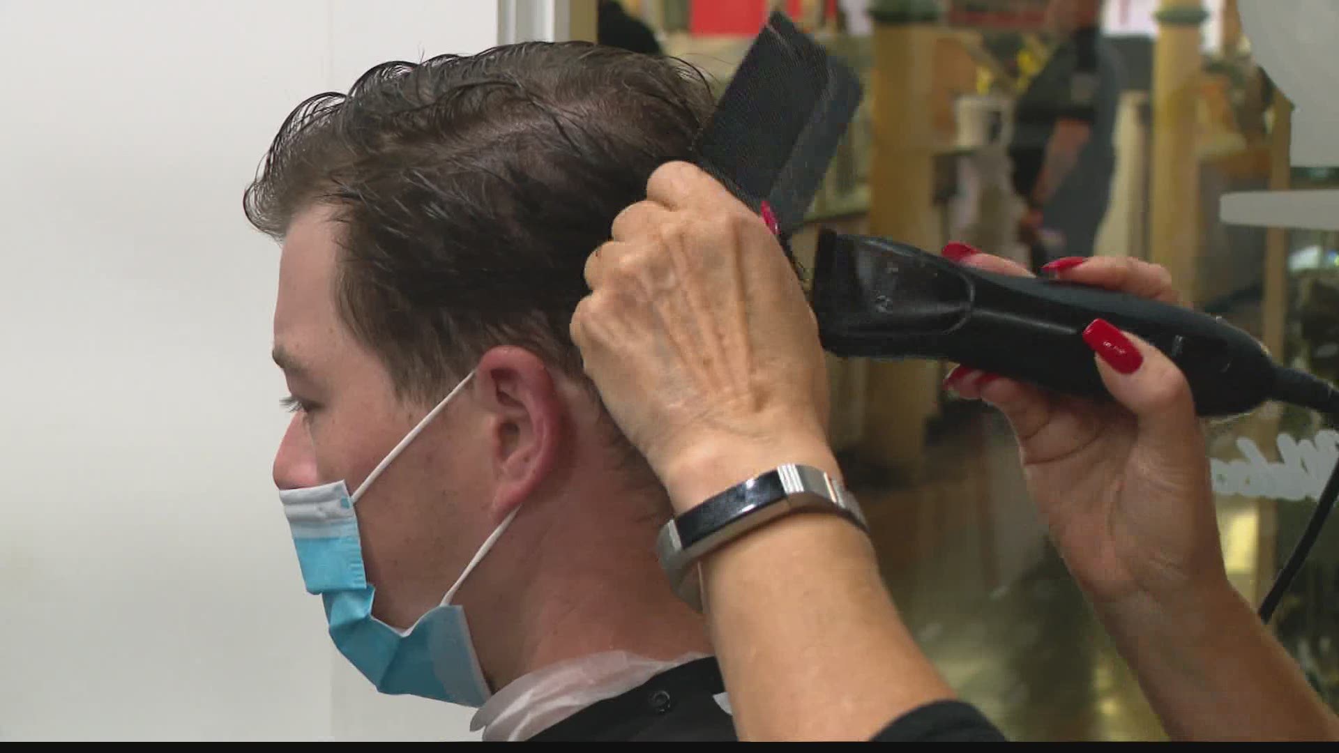 An Indianapolis barber is headed to court after being cited for not wearing a mask.