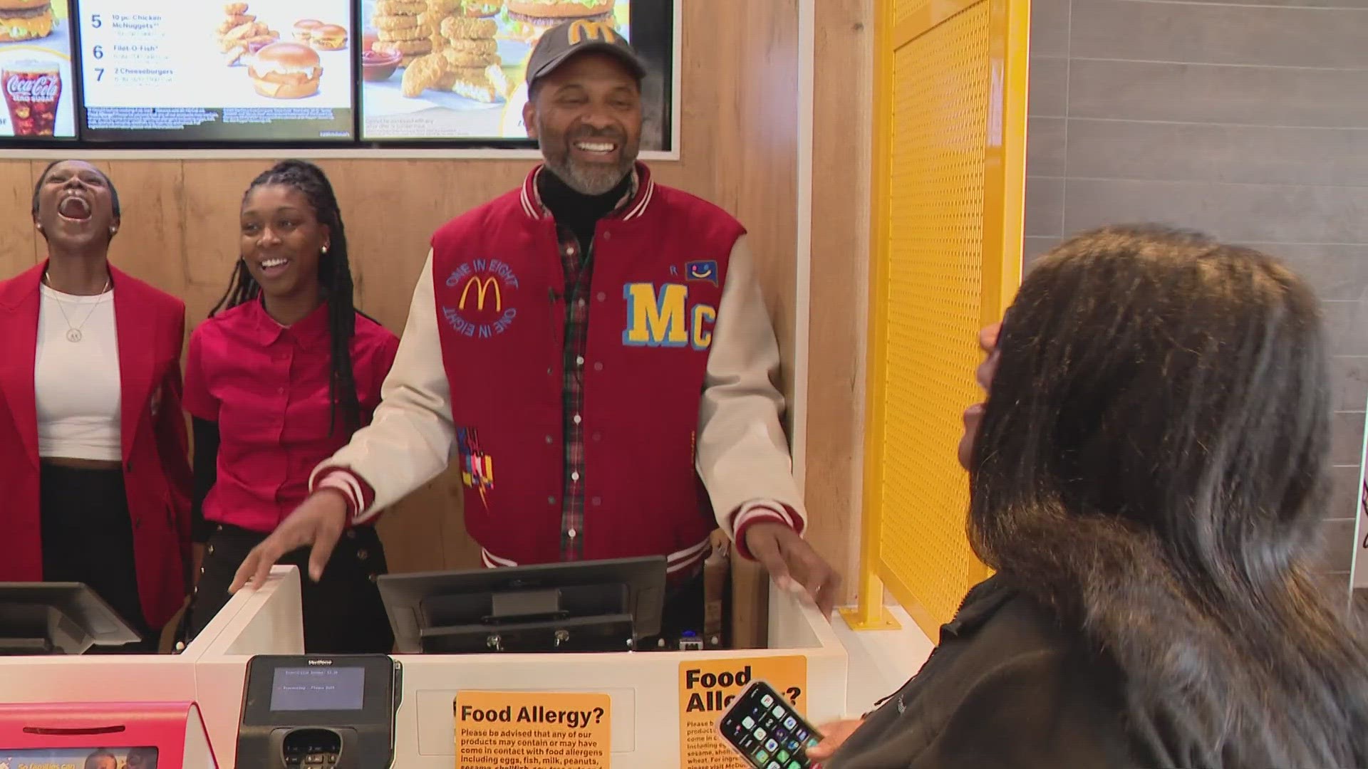 Mike Epps was presented with a 1 in 8 alumni McDonalds jacket, which represents one in 8 Americans who've worked for the restaurant chain.