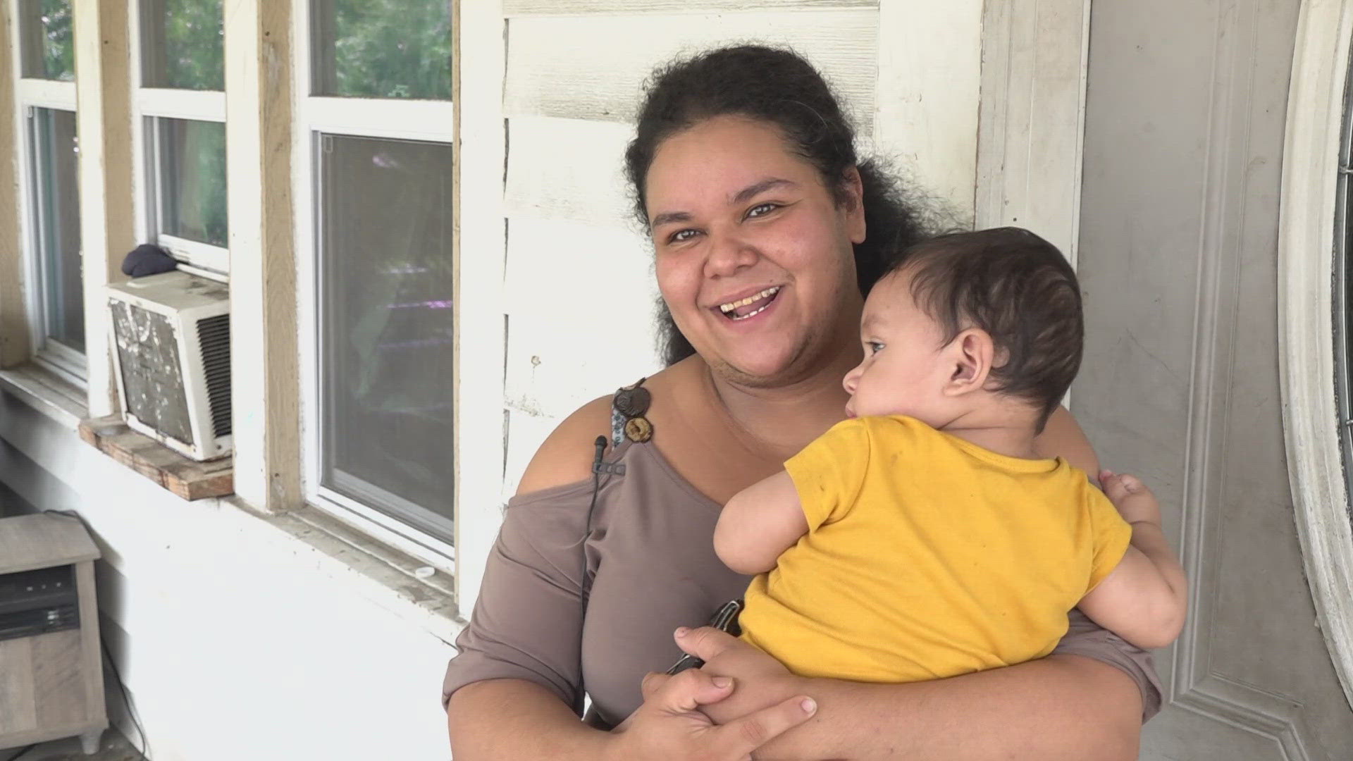 13News reporter Chase Houle talks to neighbors and witnesses who saw a carjacking take place with a child in a car on Indy's west side Thursday.