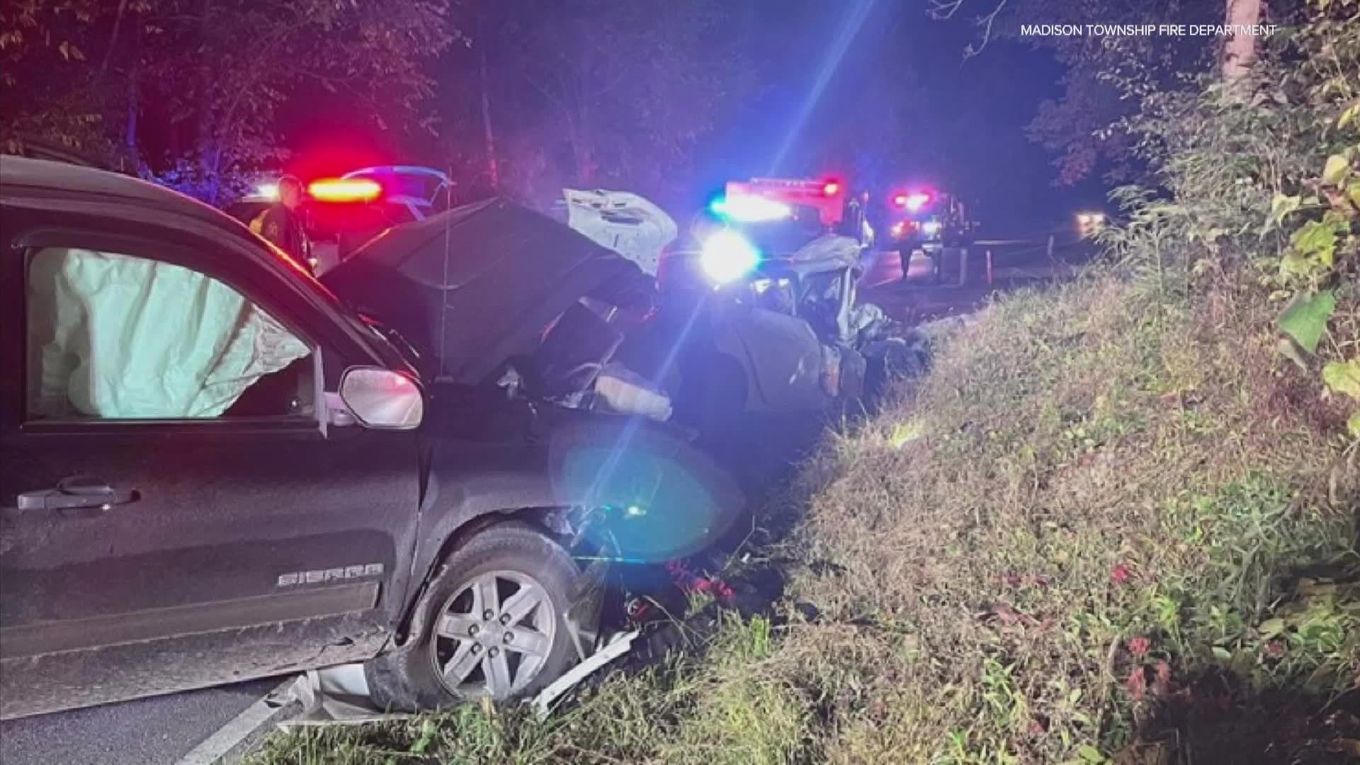 During a police chase, the suspect's car slammed into a pickup truck.