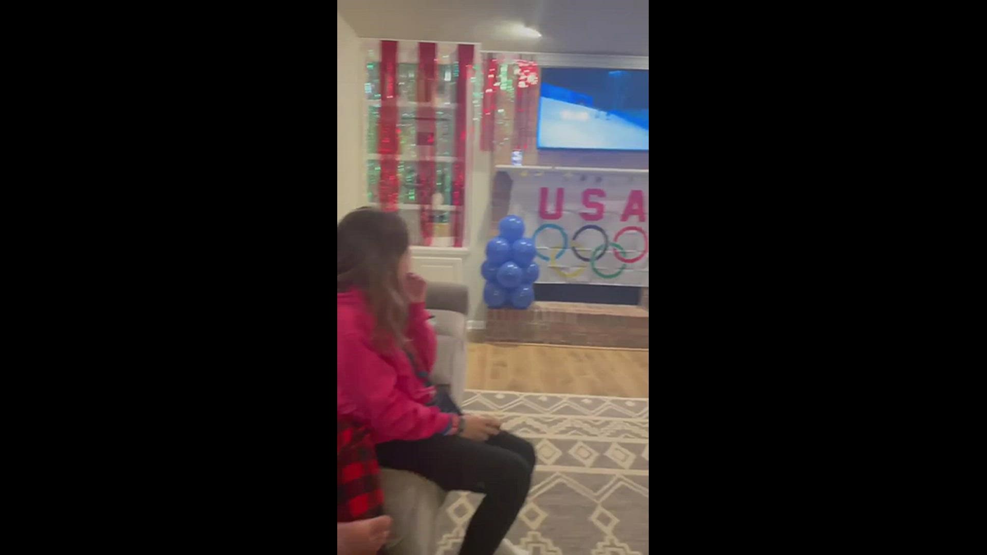 Dave Schoenefeld, Justin's uncle, shared a video with 13News of his kids waking up Thursday morning to watch their family member in the mixed team aerials event.
