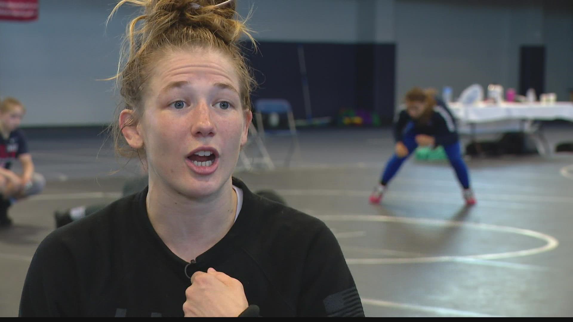 The 27 year old started wrestling in junior high school because her brothers loved the sport.