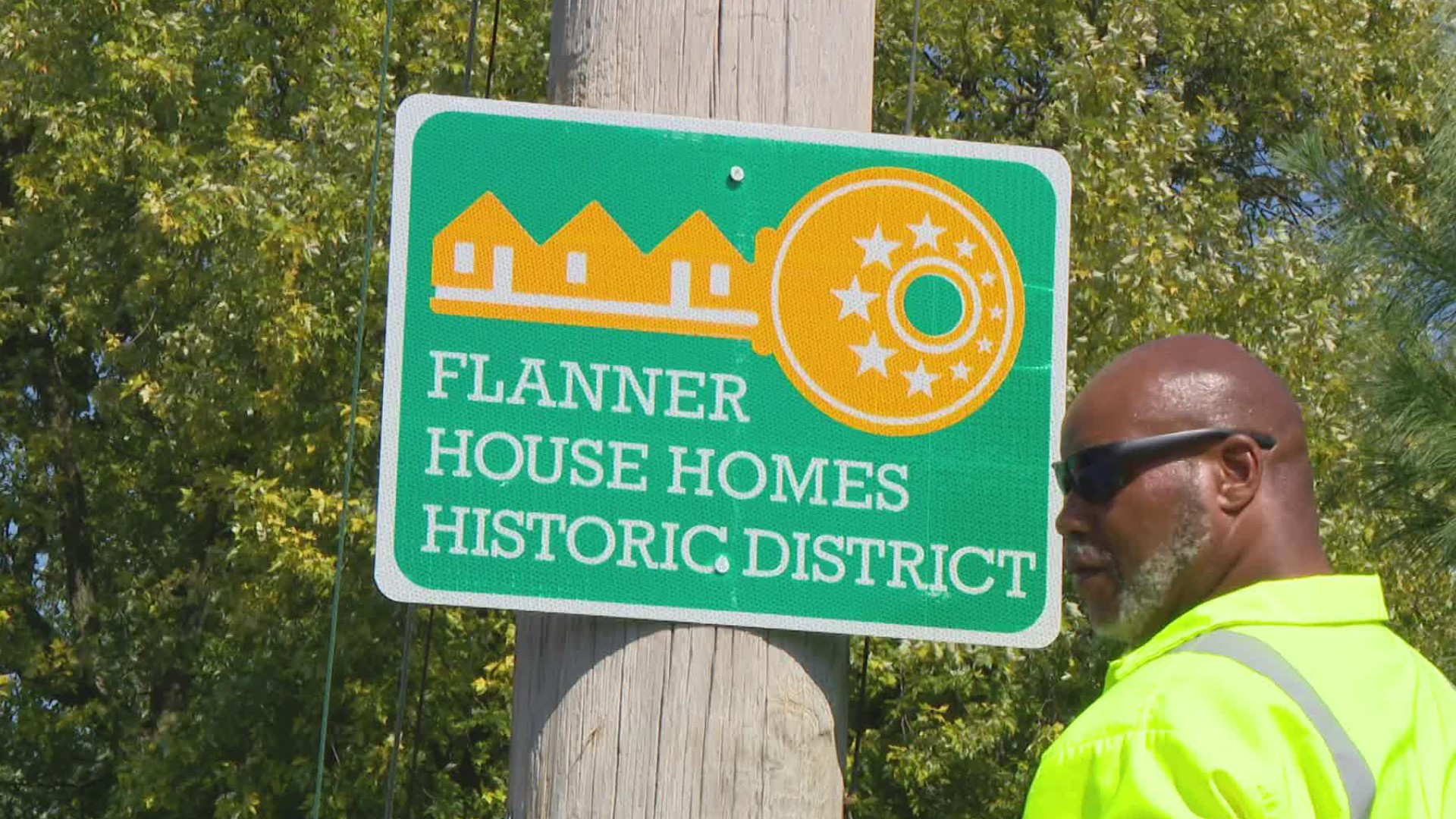 The 15 signs put up Tuesday will mark the area as part of the National Registry of Historic Districts.