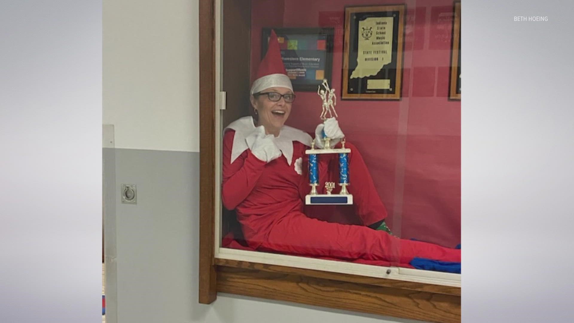 A Indiana principal is going viral after posing as the 'Elf on the Shelf' for her elementary students.