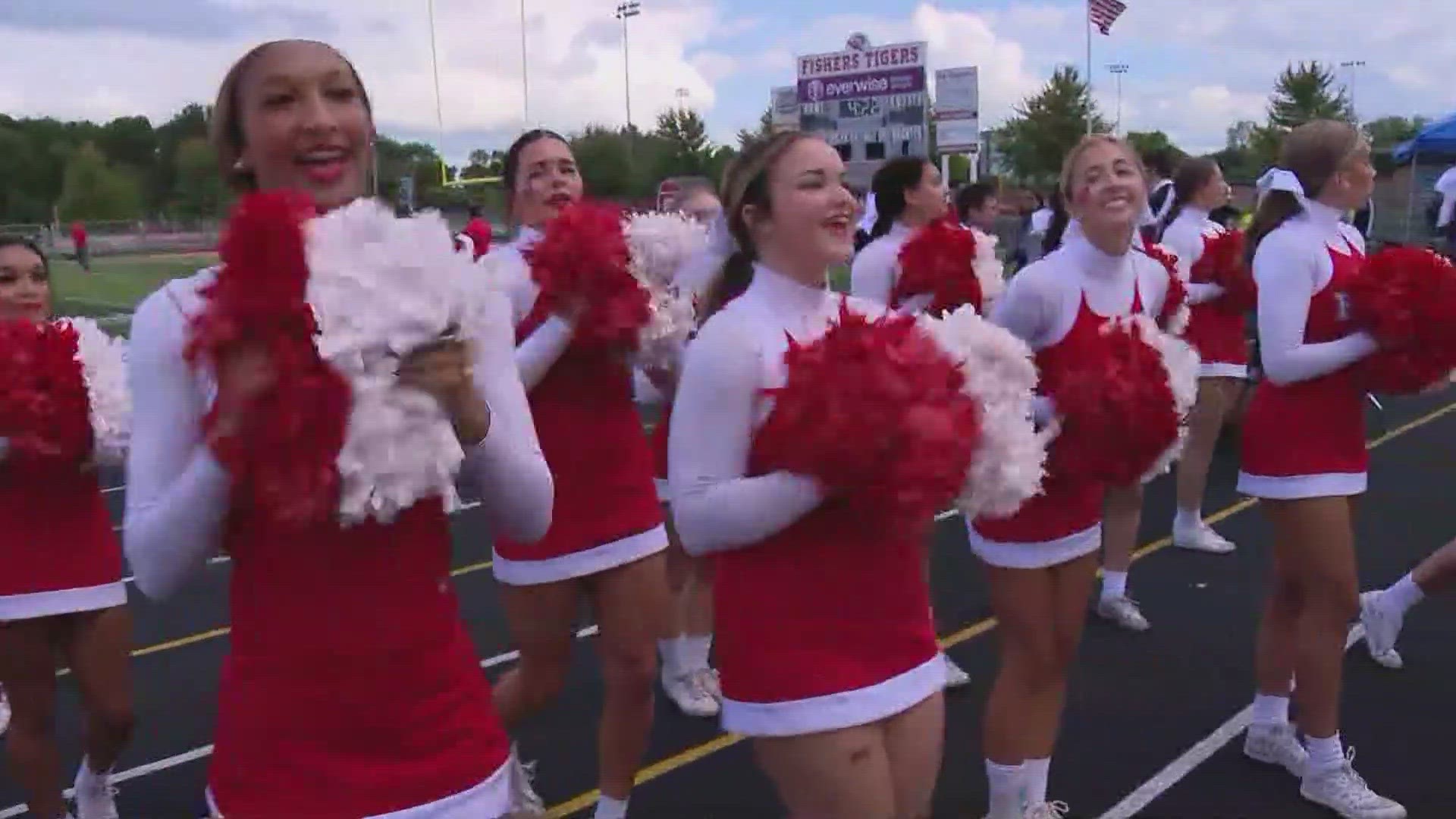 The Fishers High School cheerleaders perform a routine as the Operation Football Cheerleaders of the Week.