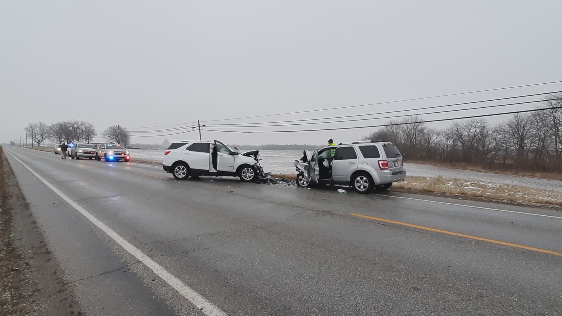 A New Palestine woman was killed Sunday morning in a crash on U.S. 52.