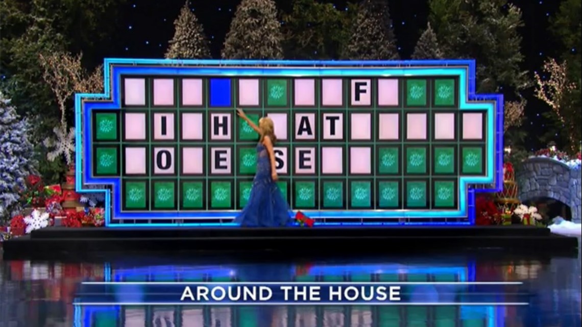 WATCH Gift latches onto Vanna White during "Wheel of Fortune" taping
