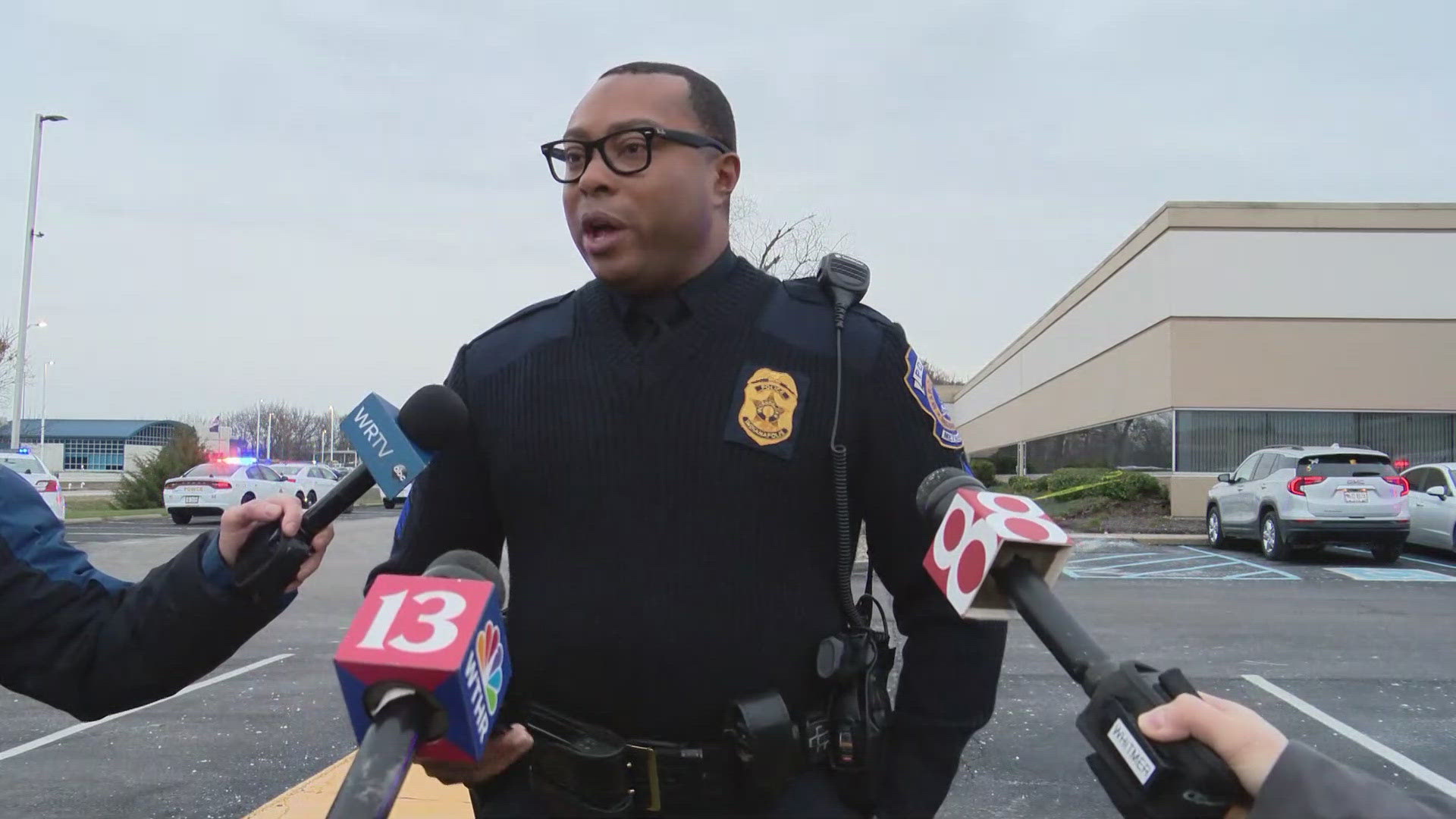 IMPD Officer William Young briefs the media about an officer-involved shooting on Indy's southeast side Wednesday afternoon.