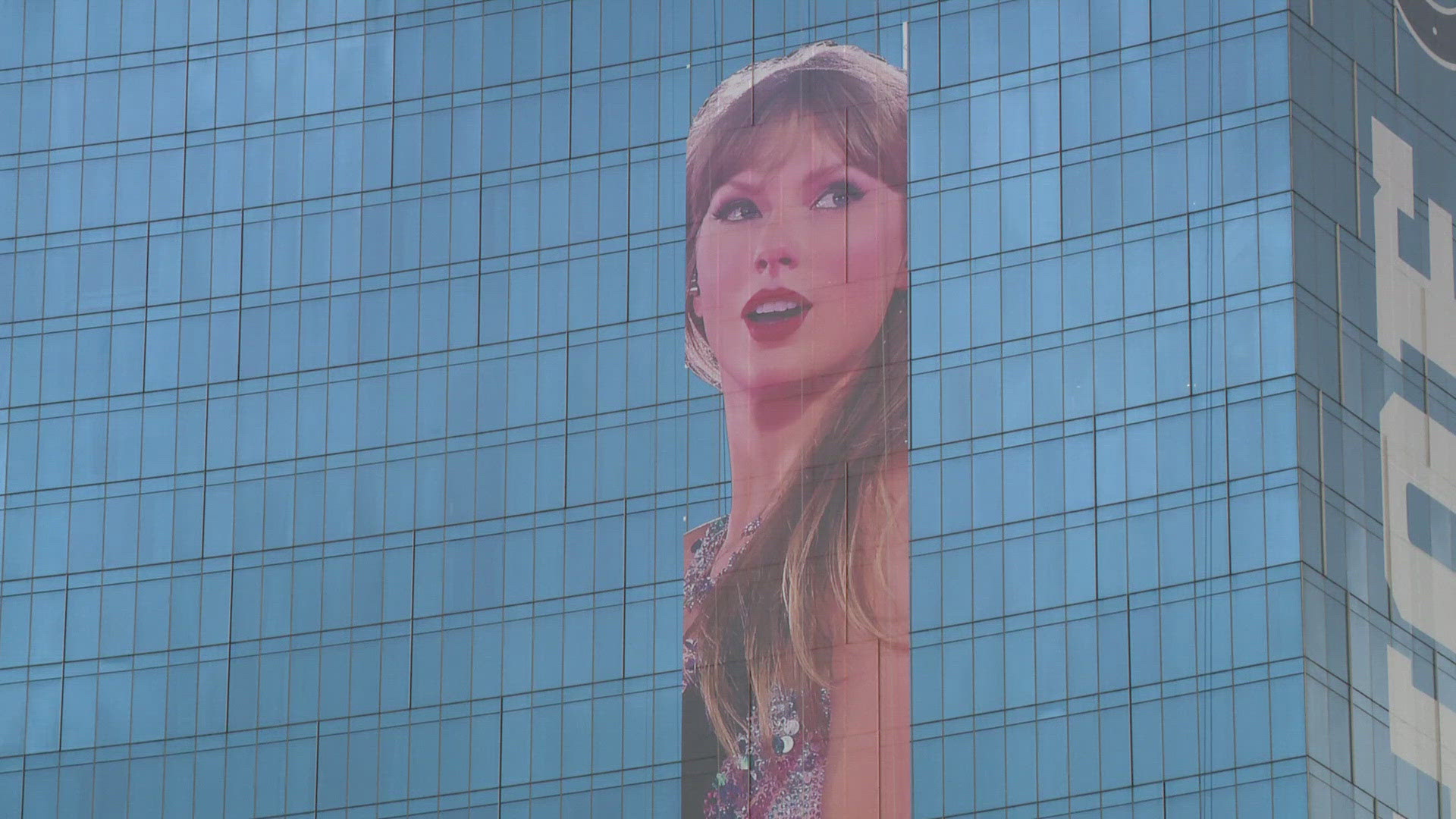 The Taylor Swift takeover of downtown Indianapolis has begun. A giant photo of the performer is going up on the side of the JW Marriott.