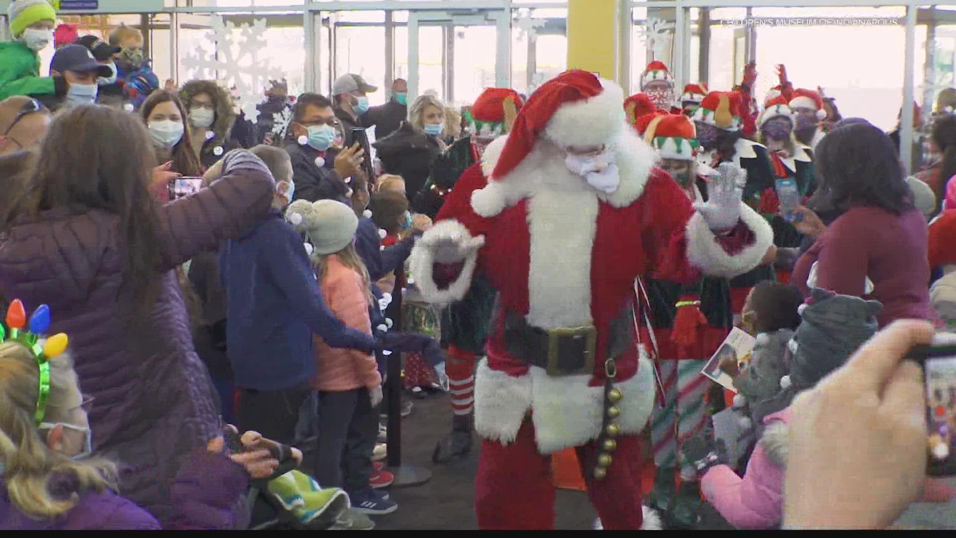 Happy Holidays, indeed! Santa was spotted far from the North Pole a day after Thanksgiving at the Children's Museum - with a little help from Tony Kanaan.