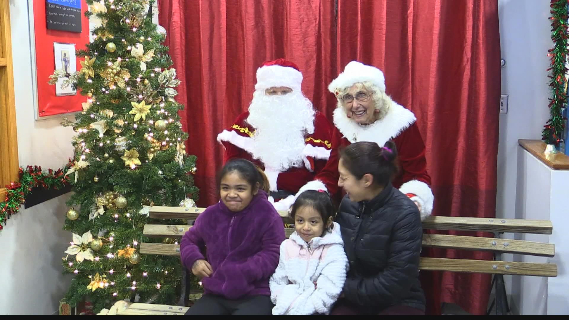 Kids took a picture with Santa, received a toy and were greeted by Santa's reindeer. It was all free of charge.