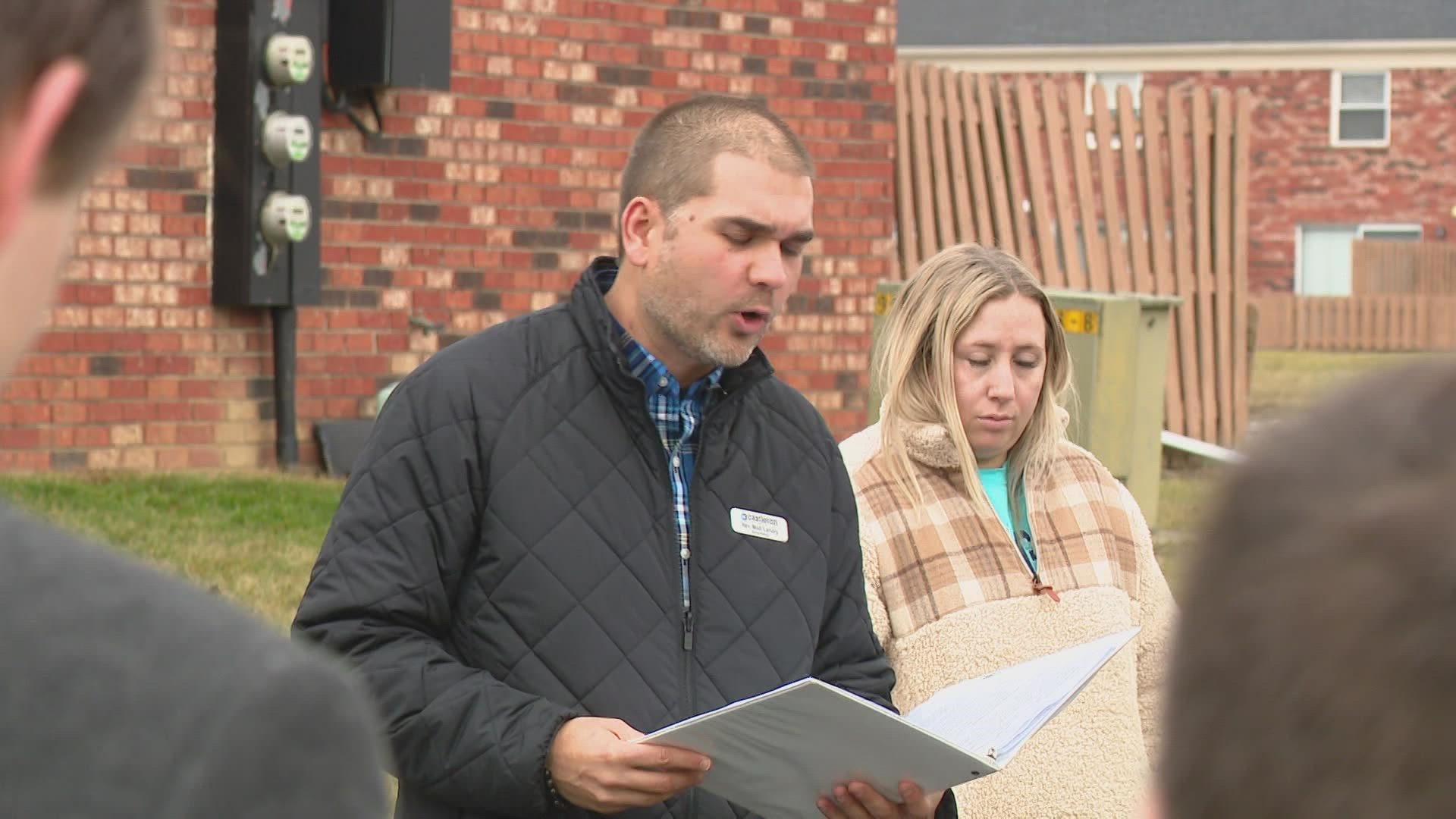 Rev. Matt Landry with Castleton United Methodist Church led the small group in prayer Sunday afternoon, as they remembered the life of 25-year-old Sean McNellye.