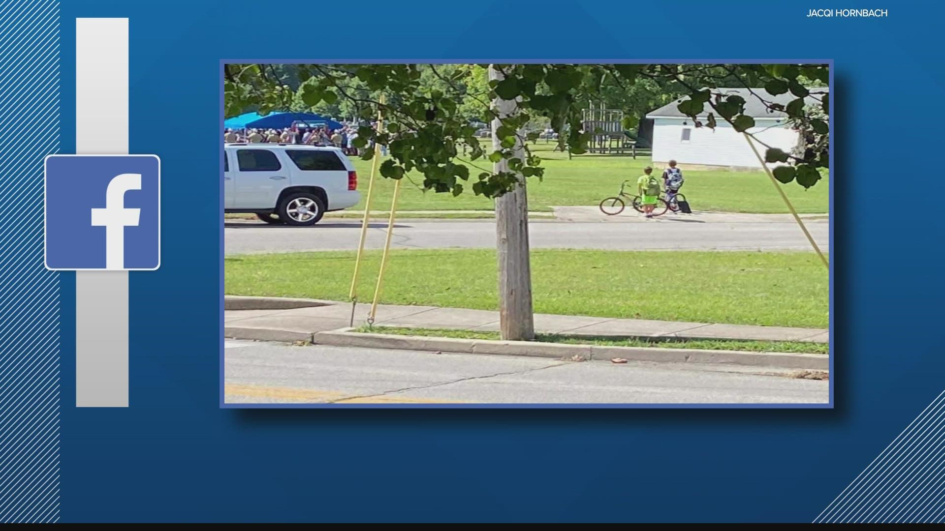 Two boys riding their bikes in Batesville stopped everything to pay their respects to a veteran's funeral.