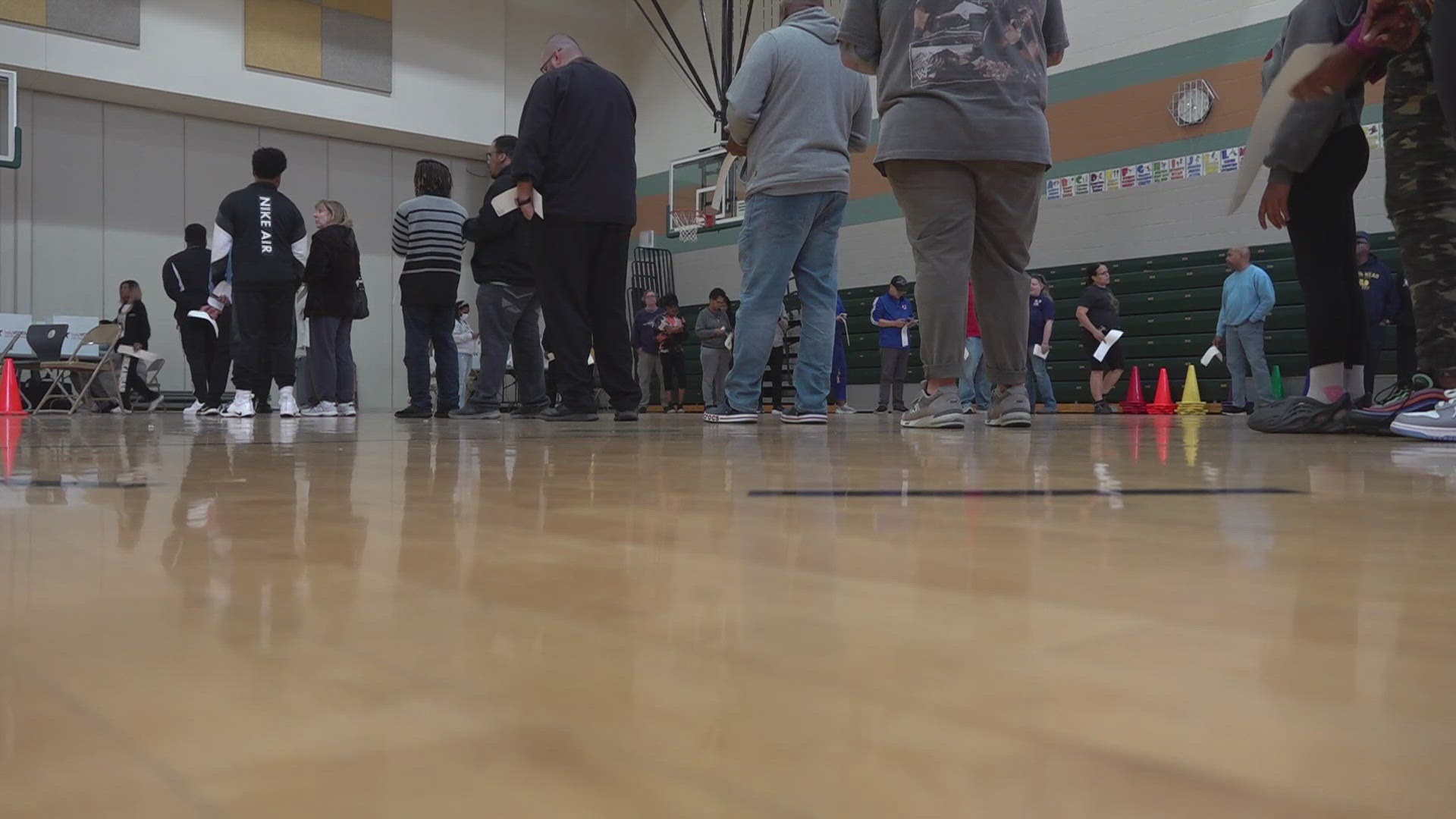 13News reporter Anna Chalker talks with people who waited in long lines to vote.