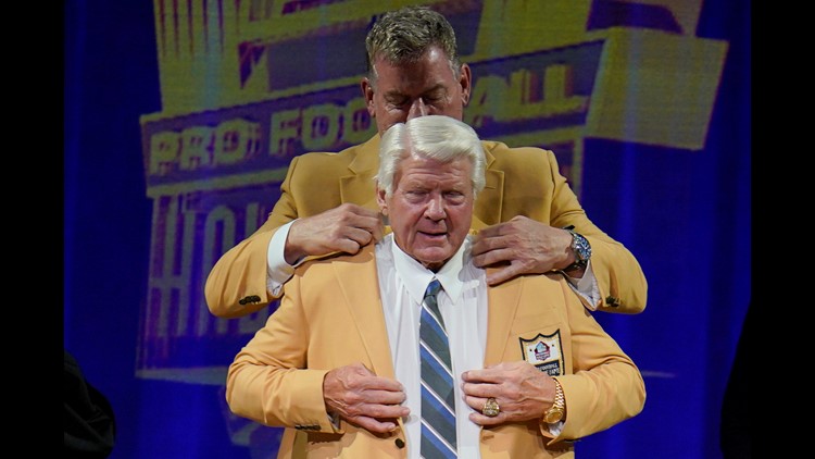 Drew Pearson, a member of the Pro Football Hall of Fame Class of 2021,  receives his gold jacket during the gold jacket dinner in Canton, Ohio,  Friday, Aug. 6, 2021 (AP Photo/Gene