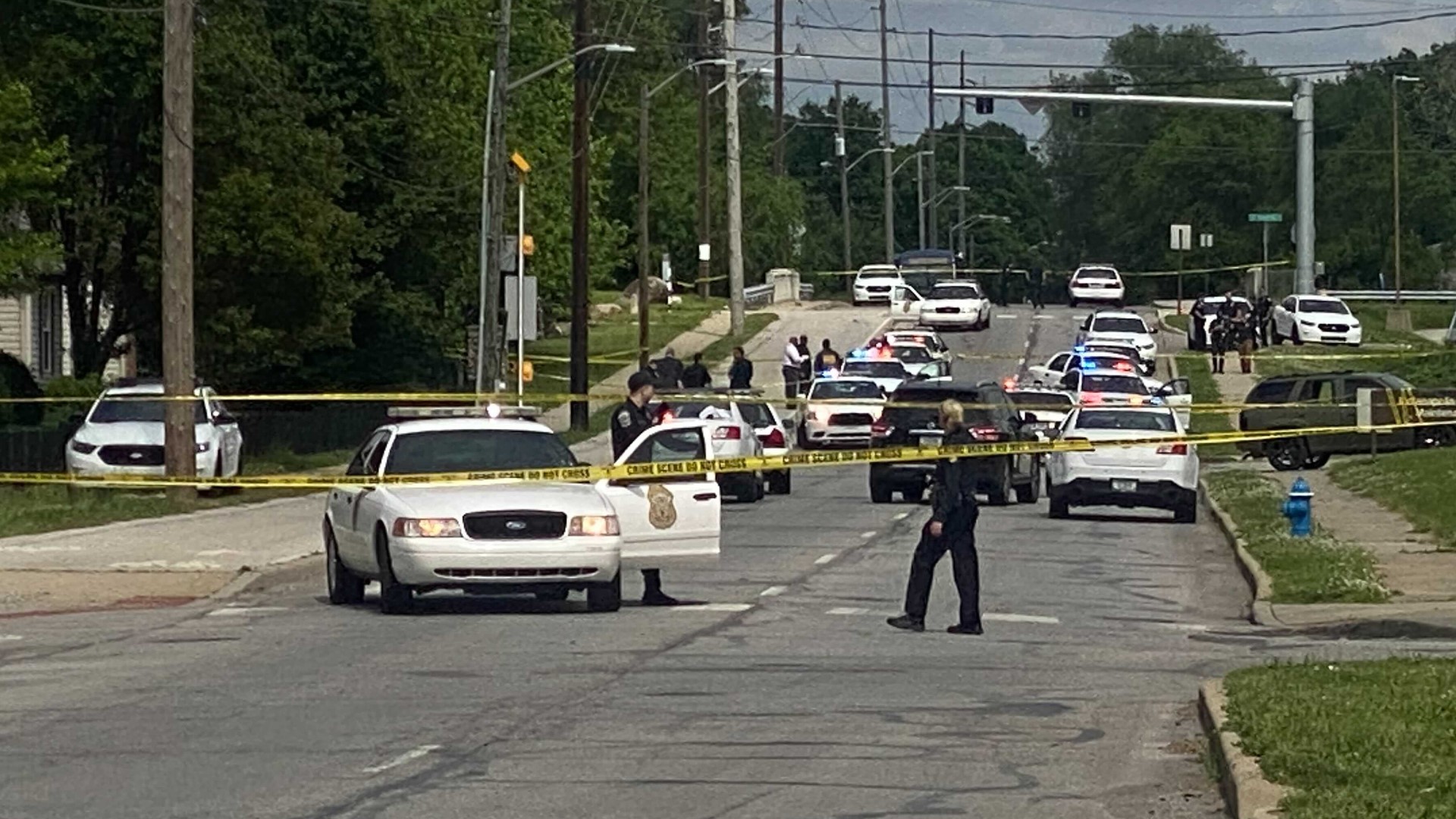 An Indianapolis police officer is alert and talking after she suffered multiple gunshot wounds while responding to a shooting on the near northwest side of the city.