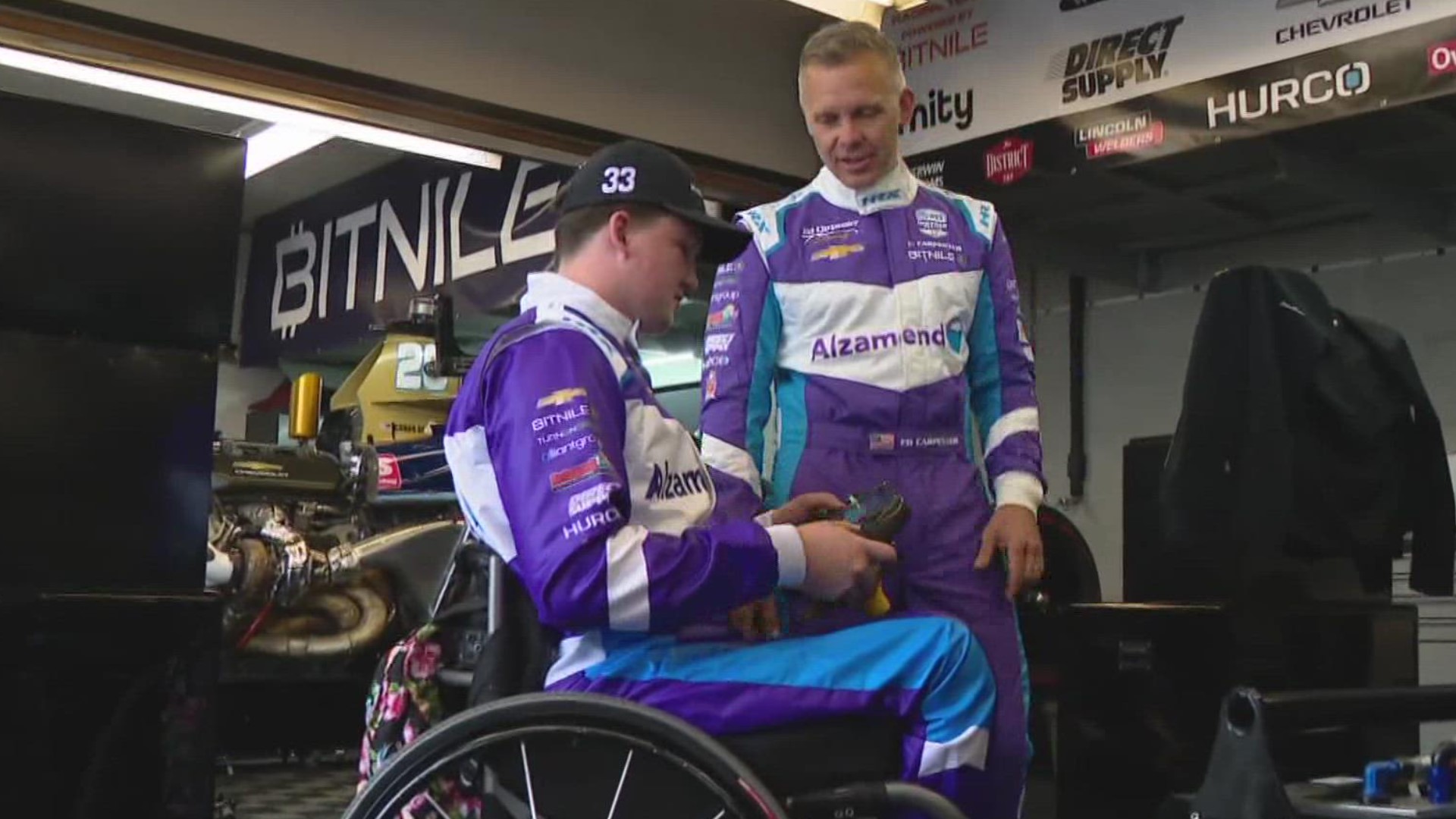 The weather did not cooperate for the second day of Indy 500 practice at the track, but Ed Carpenter met a fellow racing fan!