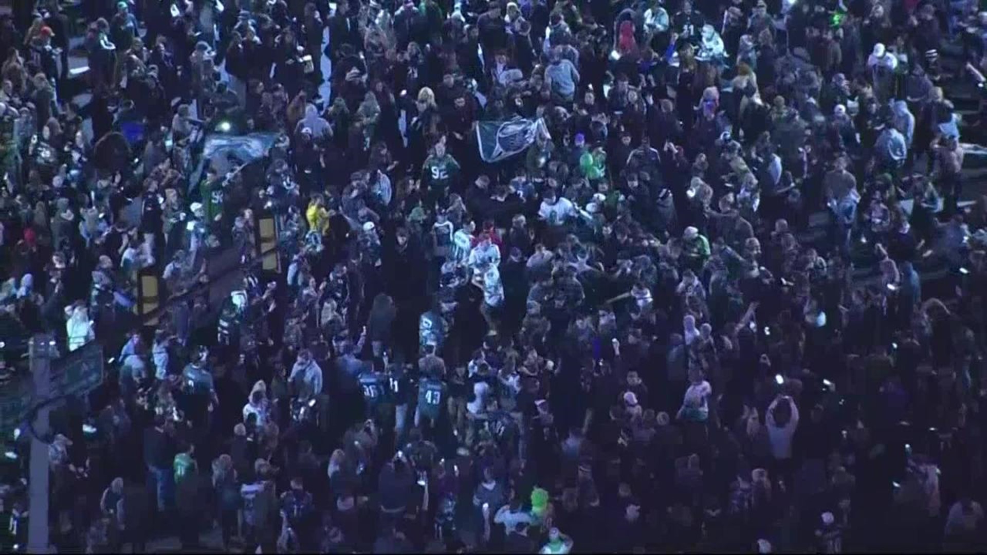 Eagles fans party in the streets, climb up greased poles after team's NFC  Championship win