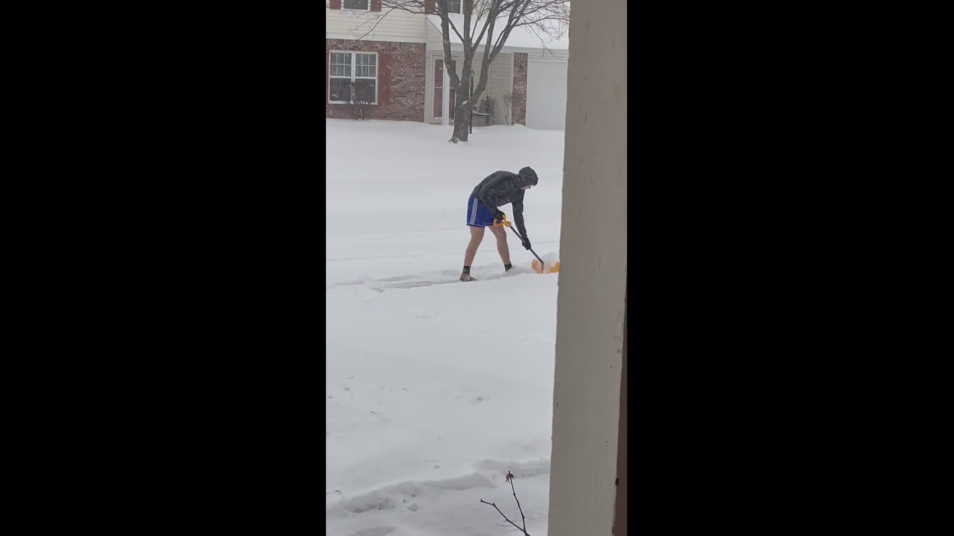 Shoveling snow in shorts in Indianapolis. Credit: Carolyn Holsapple
Credit: Carolyn Holsapple