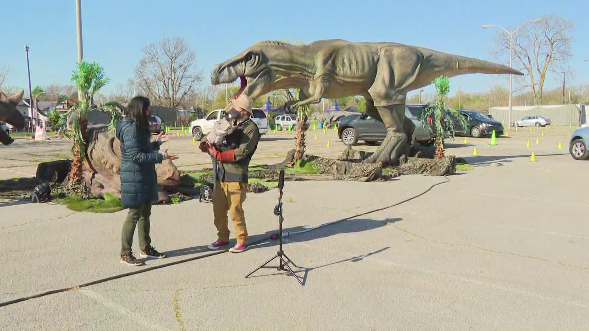 A drive-through dinosaur experience is open now at the Indiana State Fairgrounds