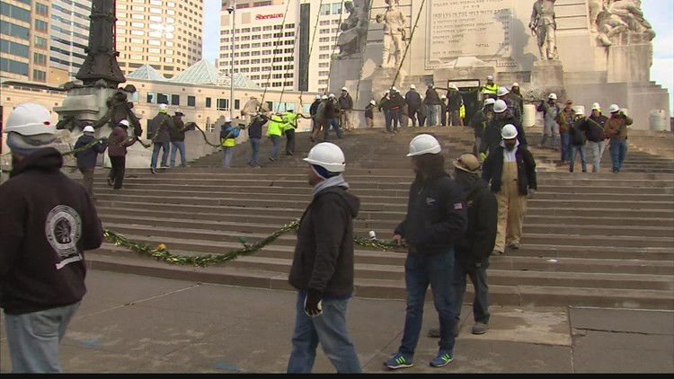 IBEW 481 prepares to install holiday lights on Monument Circle