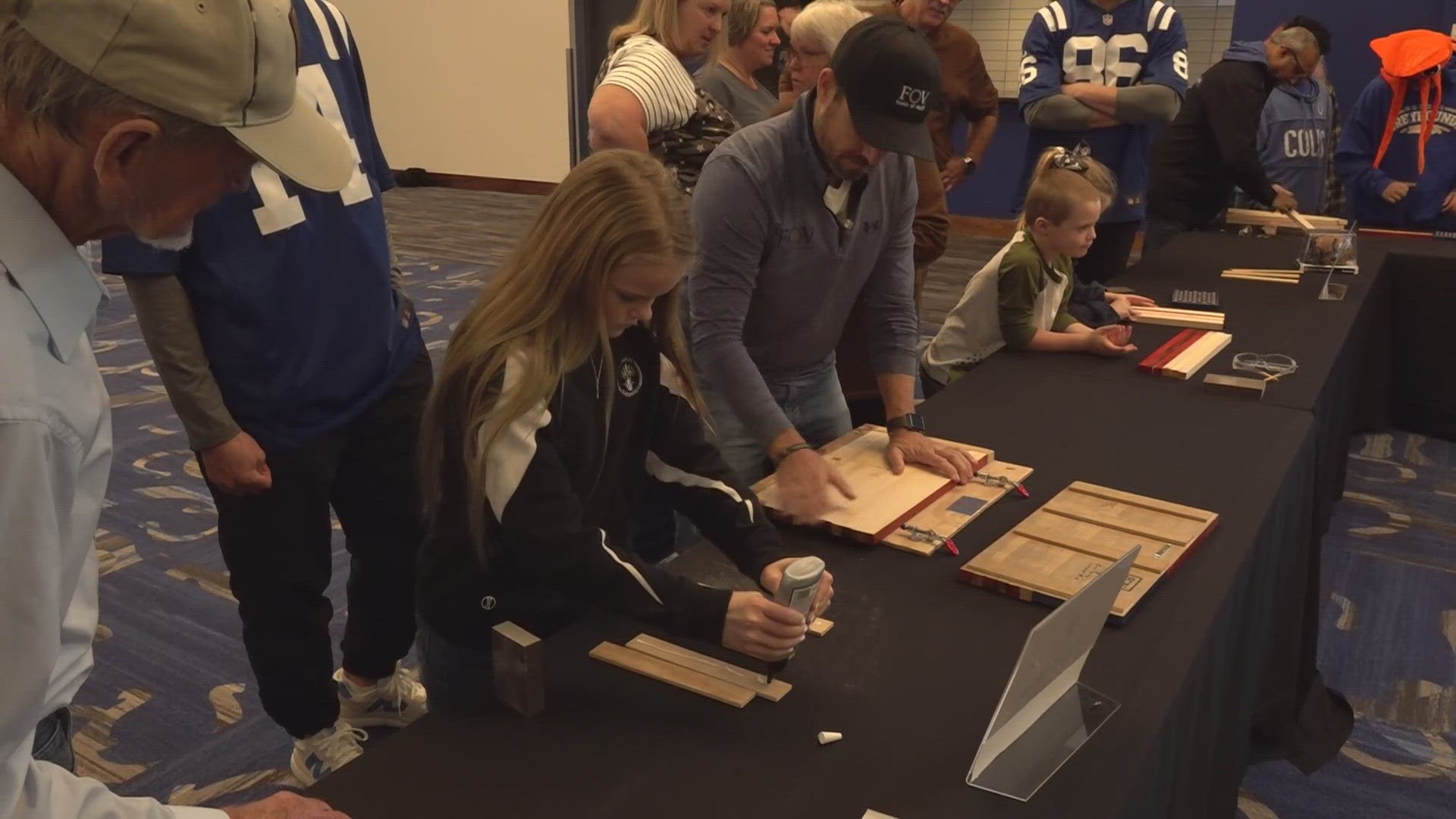 The wooden flags were crafted in memory of heroes.