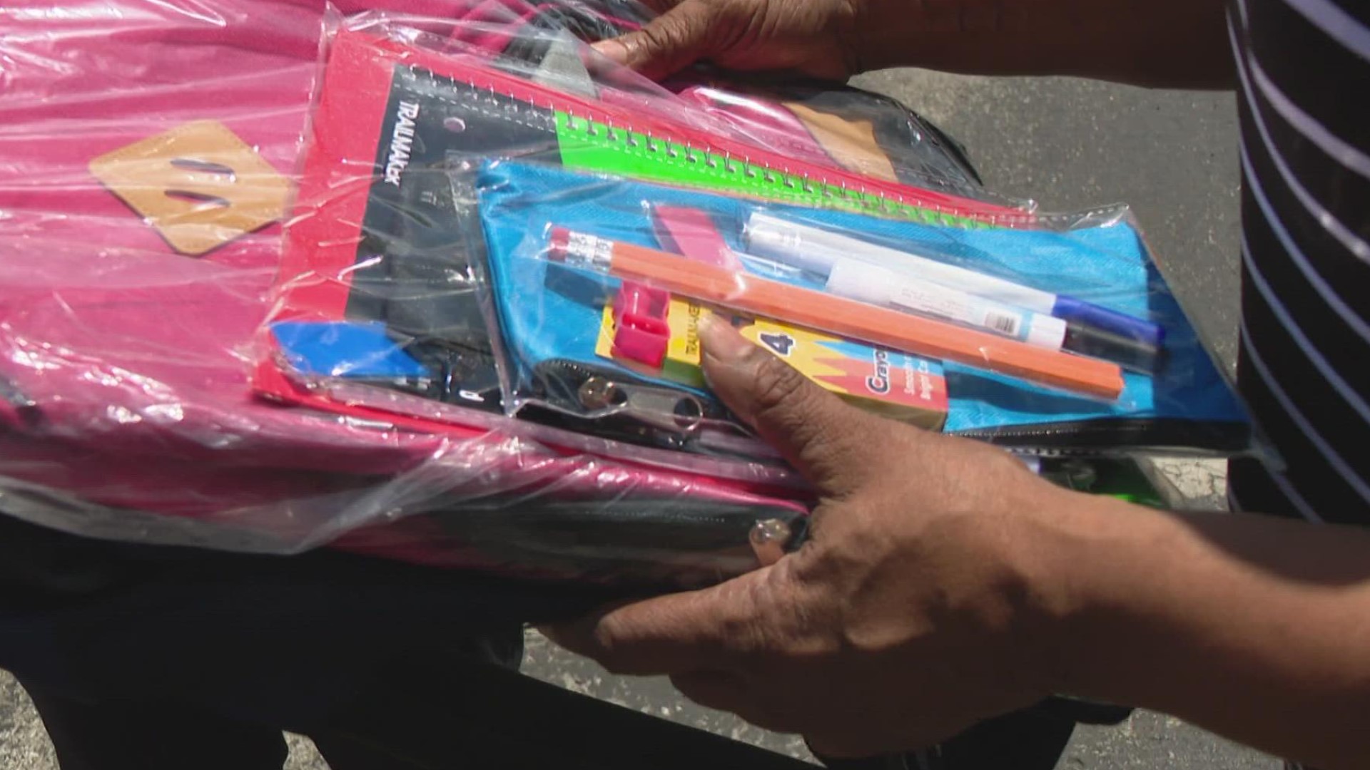 An Indianapolis couple is helping 200 kids get ready to head back-to-school.