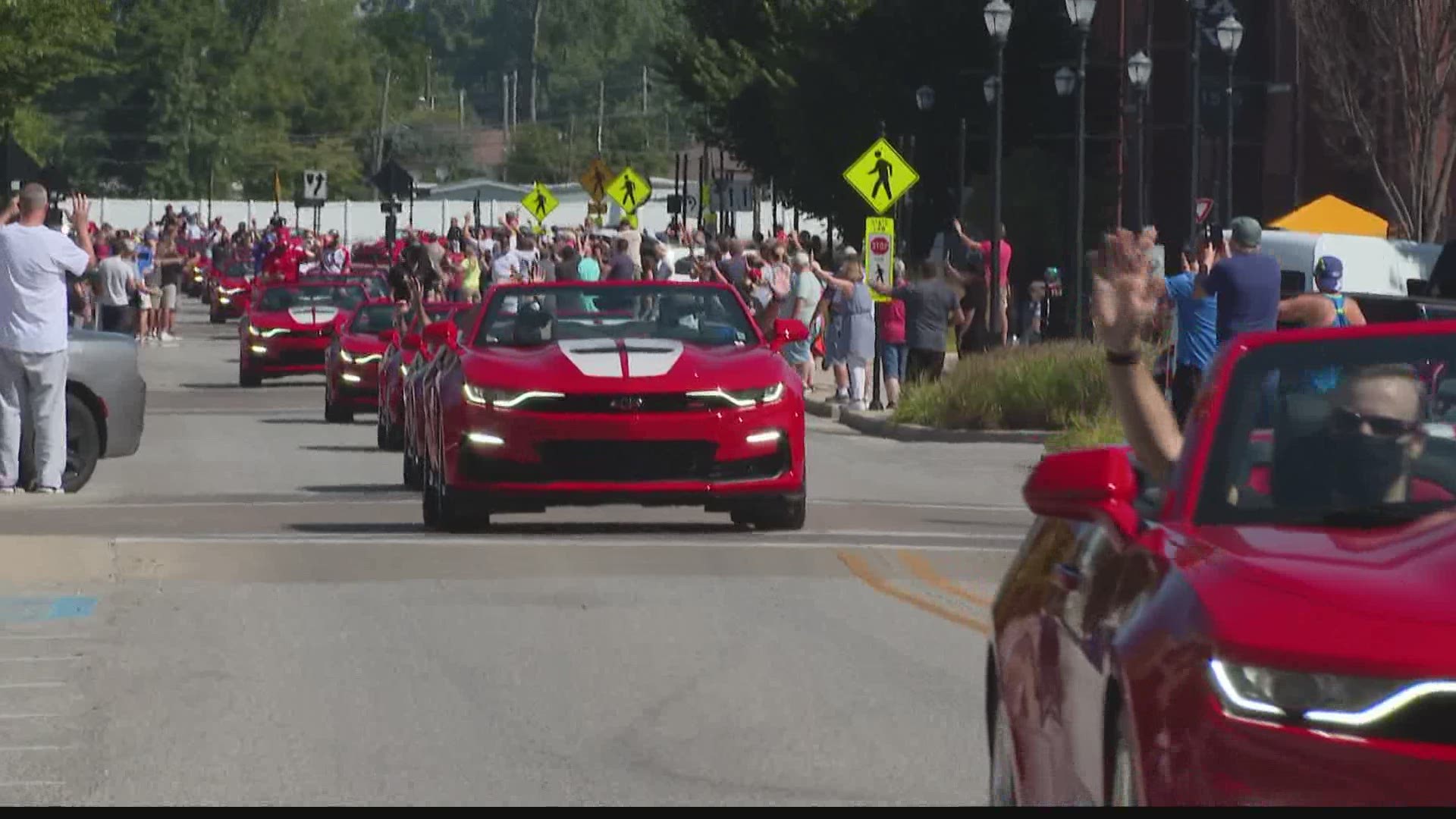 The IndyCar drivers did a short practice lap around the town of Speedway to surprise fans before race day.