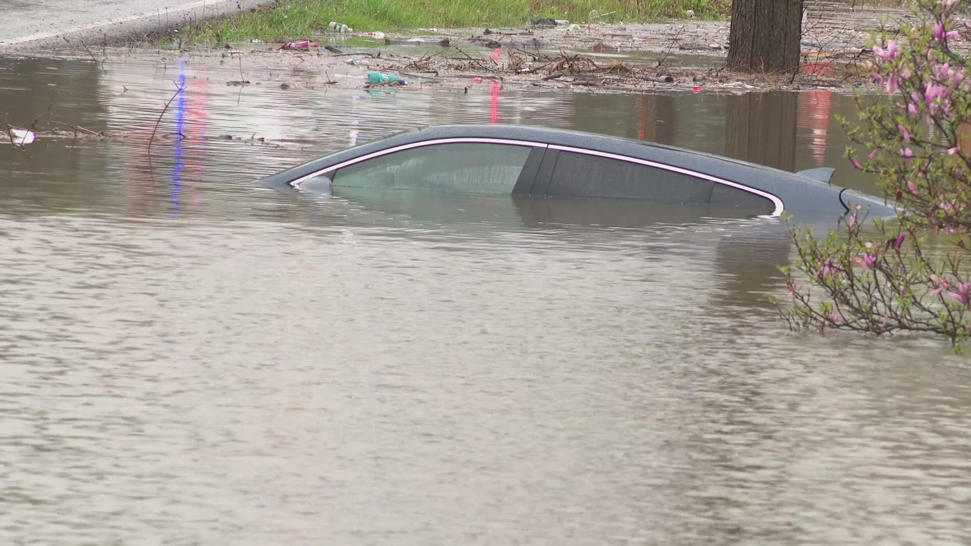 Several vehicles were stranded in floodwater Thursday morning around Indianapolis. At least one driver got to safety on the city's northeast side with some help.